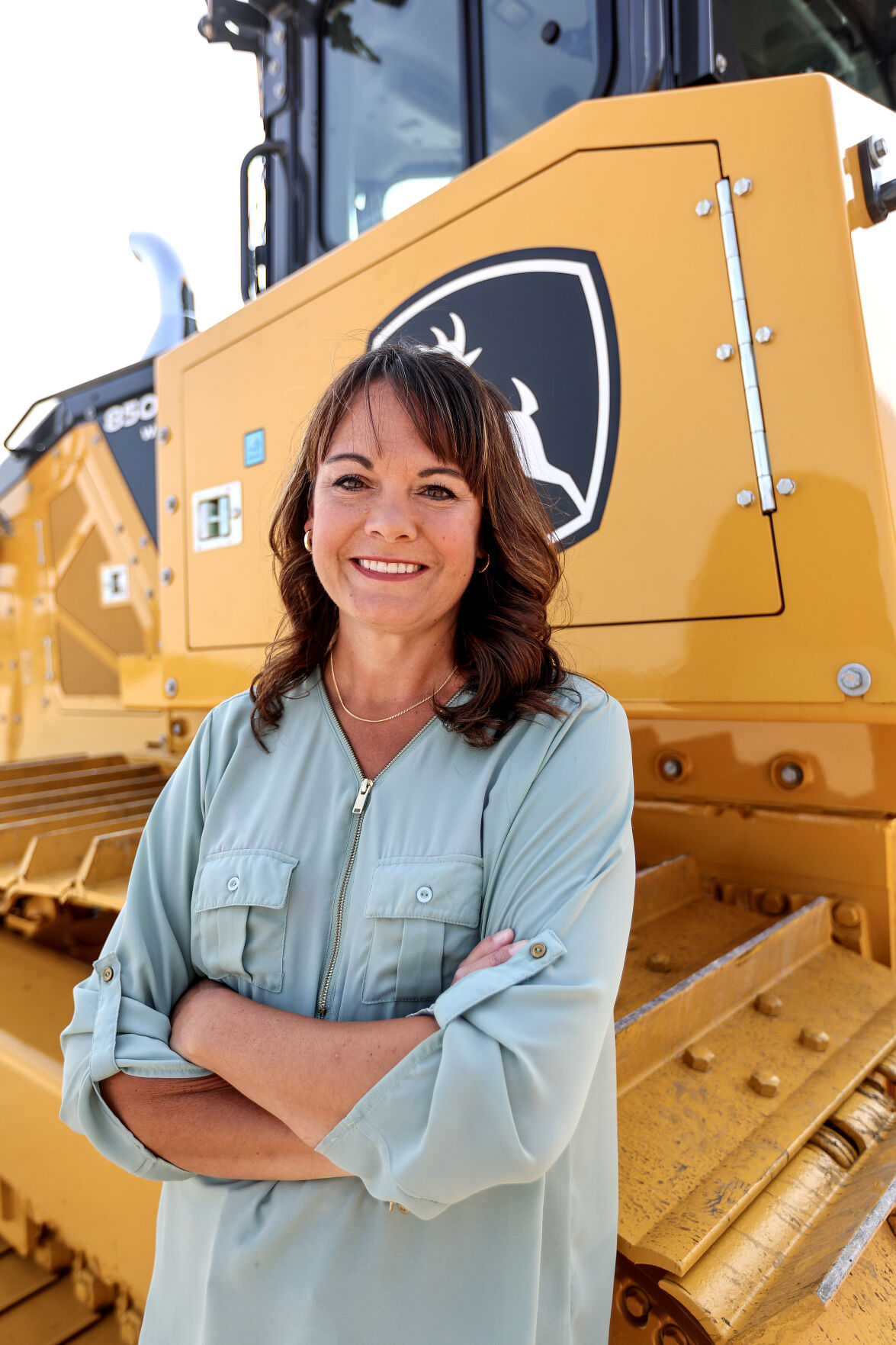 Dawn Lueken is the program manager for the crawlers construction & forestry division at John Deere Dubuque Works. Dawn is the Business Times Woman of Innovation 2024.    PHOTO CREDIT: Dave Kettering