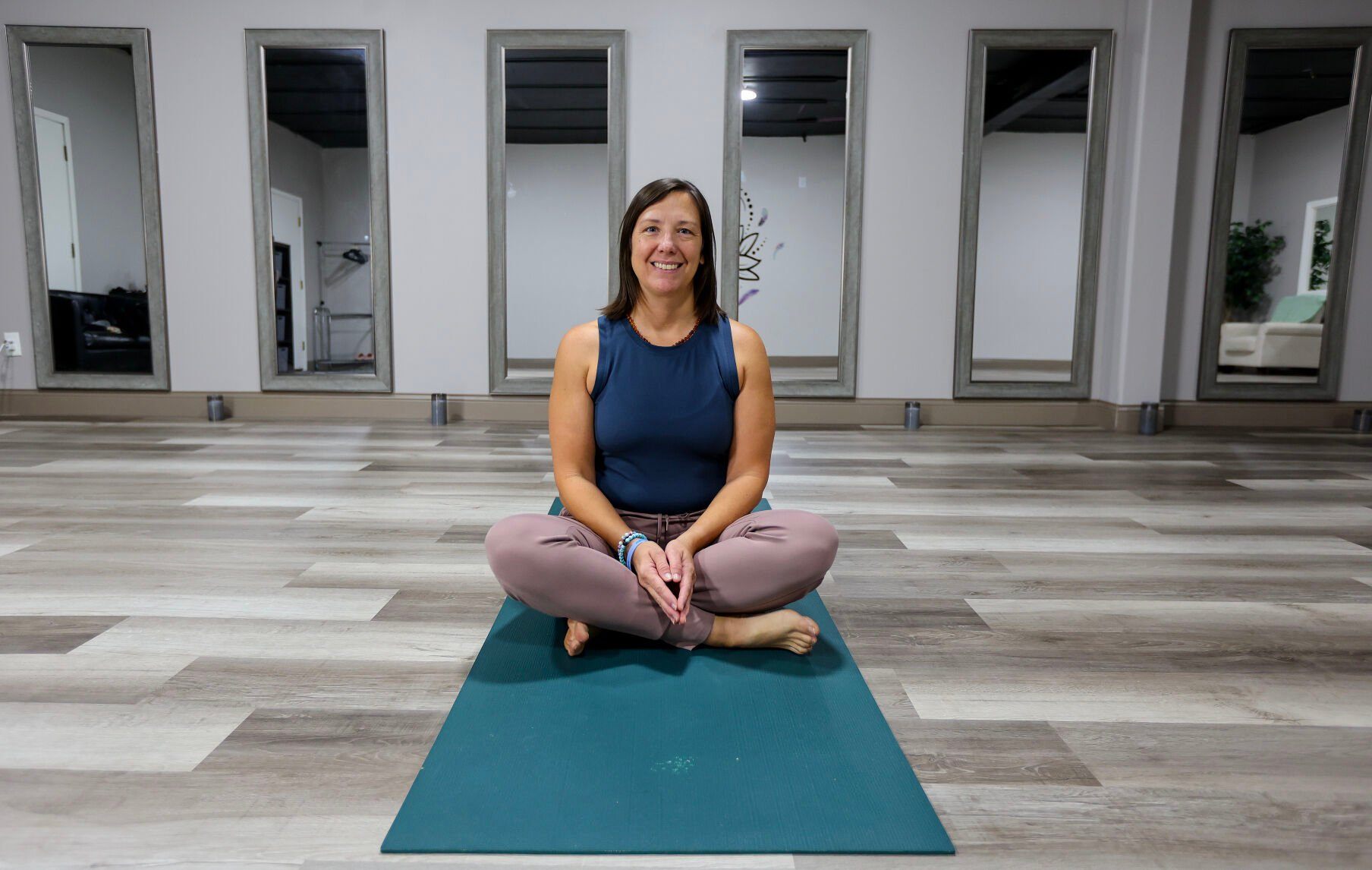 Kellie Cook is the owner of The Well, a yoga and wellness center set to open in early October in Dubuque.    PHOTO CREDIT: Dave Kettering