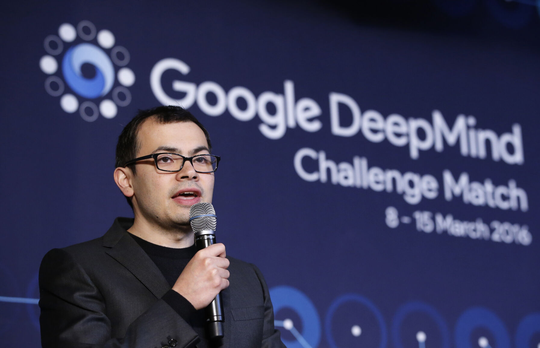 FILE - Google DeepMind CEO Demis Hassabis answers a reporter