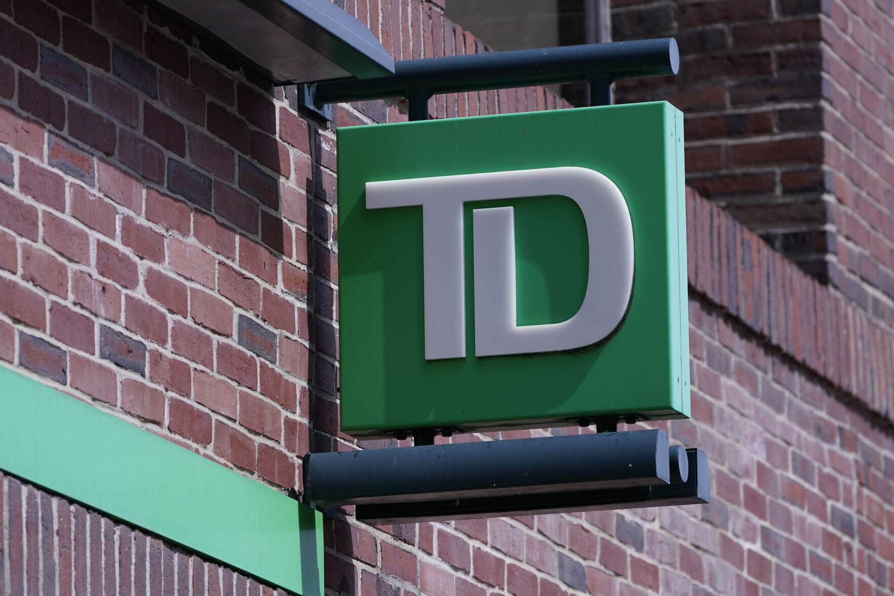 FILE - A sign hangs on TD Bank branch, Tuesday, April 5, 2022, in Boston. (AP Photo/Charles Krupa, File)    PHOTO CREDIT: Associated Press