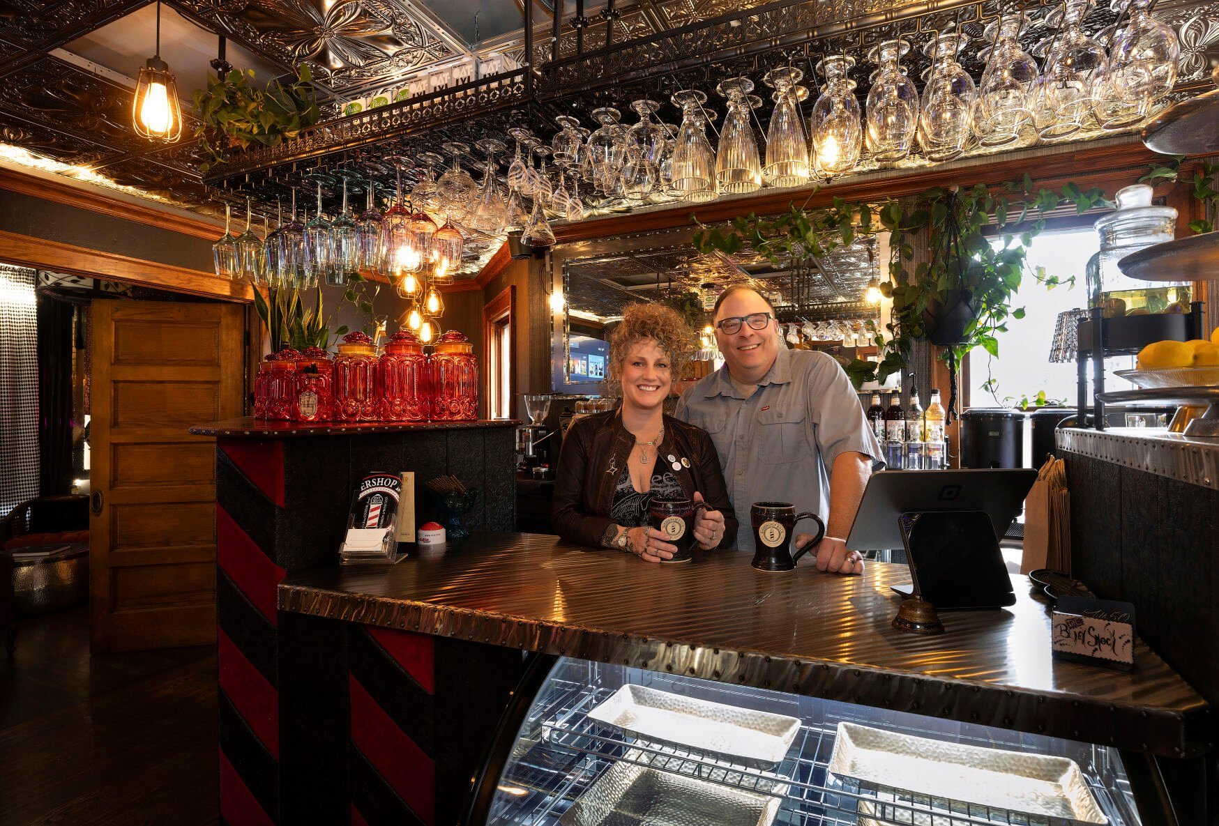 Owners Lisa and Jeff Haas stand behind the counter of The Black Smock in Platteville, Wis., on Monday.    PHOTO CREDIT: Stephen Gassman