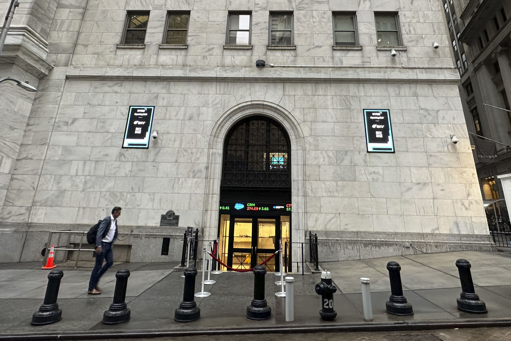 <p>FILE - A man approaches an entrance to the New York Stock Exchange on Sept. 26, 2024, in New York. (AP Photo/Peter Morgan, File)</p>   PHOTO CREDIT: Peter Morgan - staff, ASSOCIATED PRESS