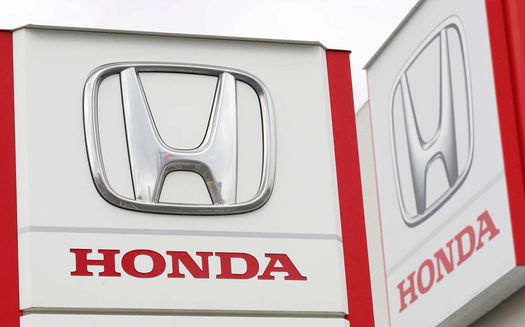 <p>FILE - Logos of Honda Motor Co. are pictured in Tsukuba, northeast of Tokyo, Feb. 13, 2019. (Kyodo News via AP, File)</p>   PHOTO CREDIT: Kyodo News via AP