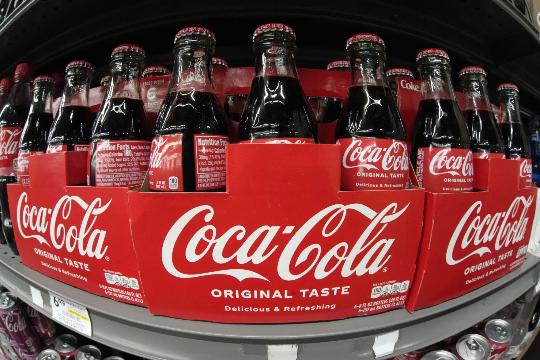 <p>FILE - Coca Cola is displayed in a market in Pittsburgh on Jan. 26, 2023. (AP Photo/Gene J. Puskar, File)</p>   PHOTO CREDIT: Gene J. Puskar 