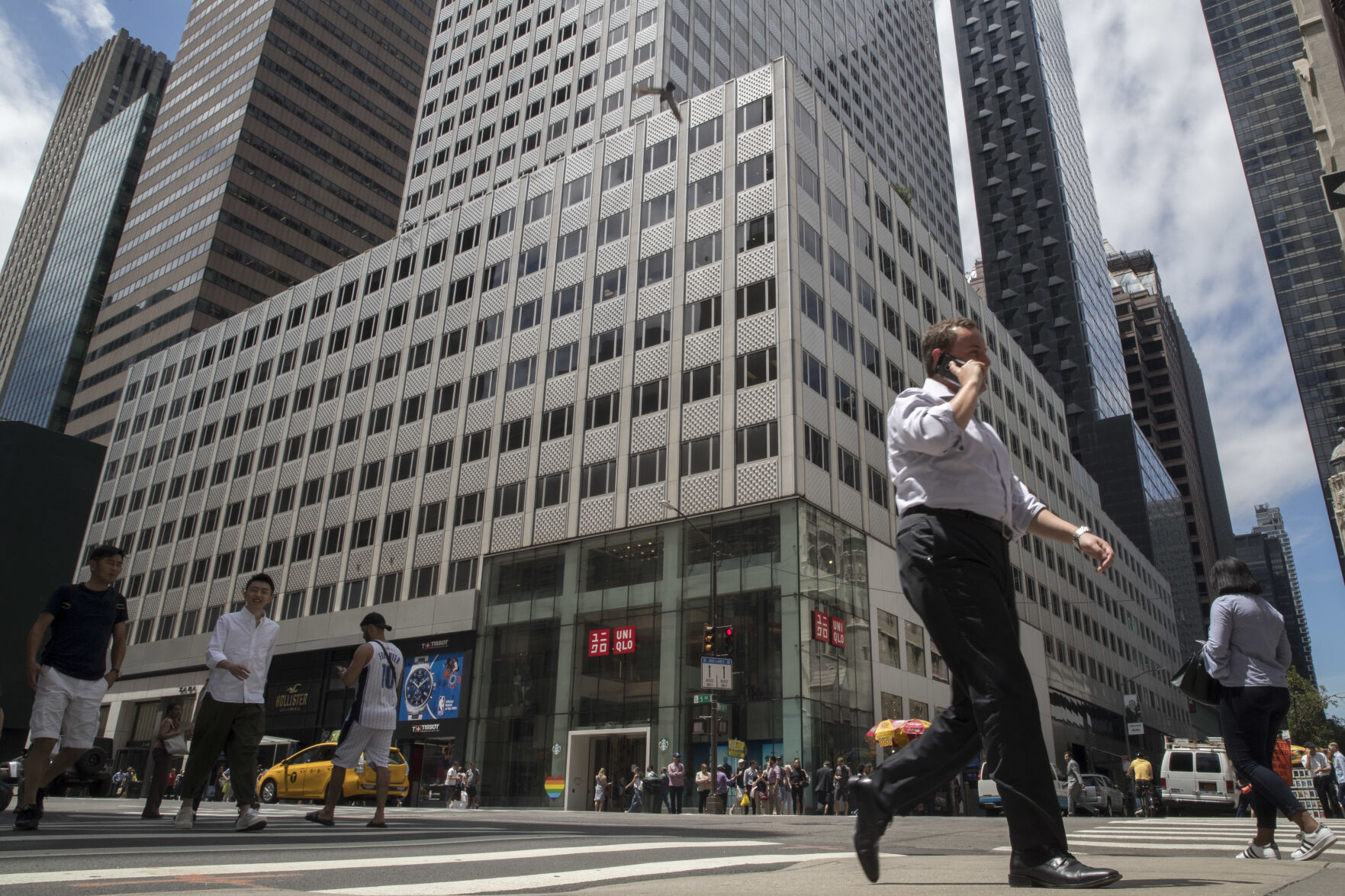 <p>FILE - Pedestrians walk past 666 Fifth Avenue, June 20, 2018, in New York. (AP Photo/Mary Altaffer, File)</p>   PHOTO CREDIT: Mary Altaffer 