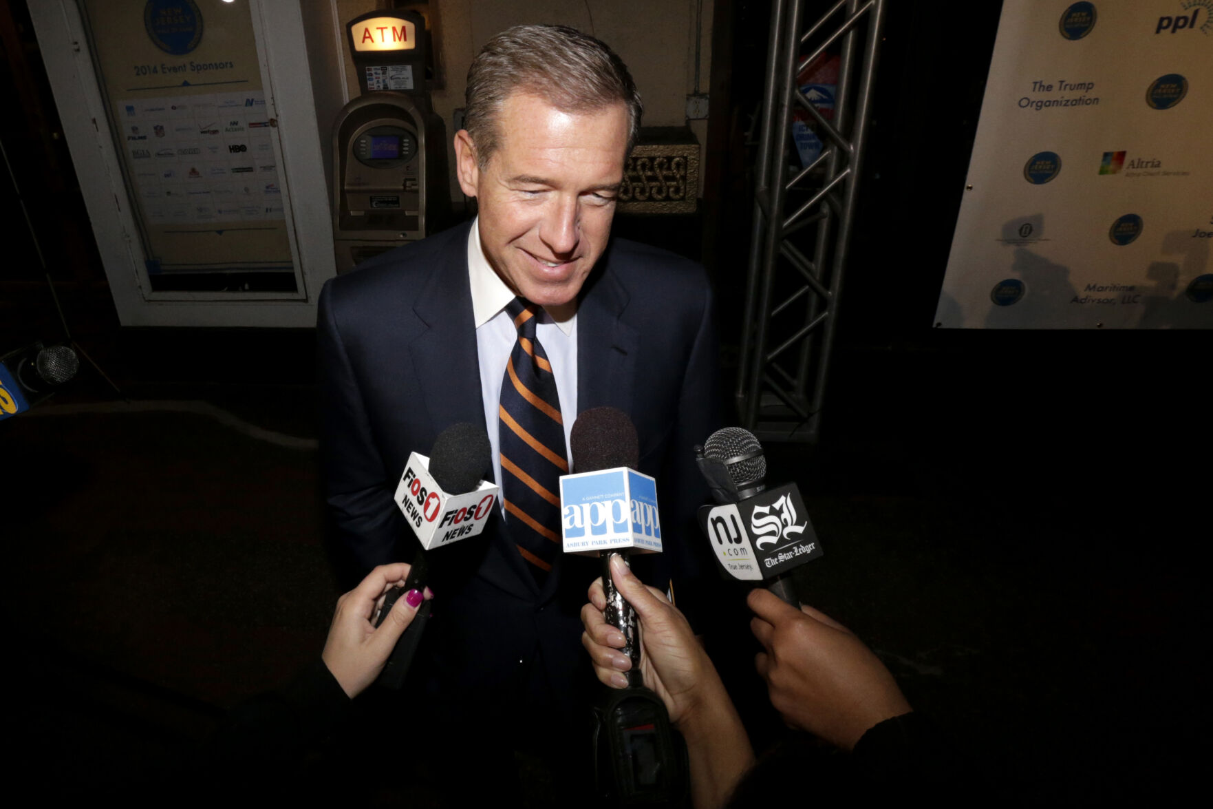 <p>FILE - Television journalist Brian Williams arrives at the Asbury Park Convention Hall during red carpet arrivals prior to the New Jersey Hall of Fame inductions, in Asbury Park, N.J., Nov. 13, 2014. (AP Photo/Julio Cortez, File)</p>   PHOTO CREDIT: Julio Cortez 