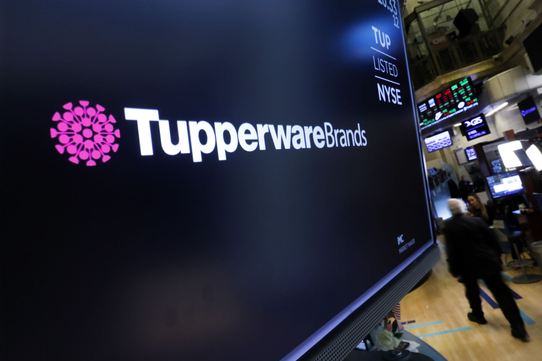 <p>FILE - The logo for Tupperware Brands appears above a trading post on the floor of the New York Stock Exchange on Oct. 30, 2019. (AP Photo/Richard Drew)</p>   PHOTO CREDIT: Richard Drew