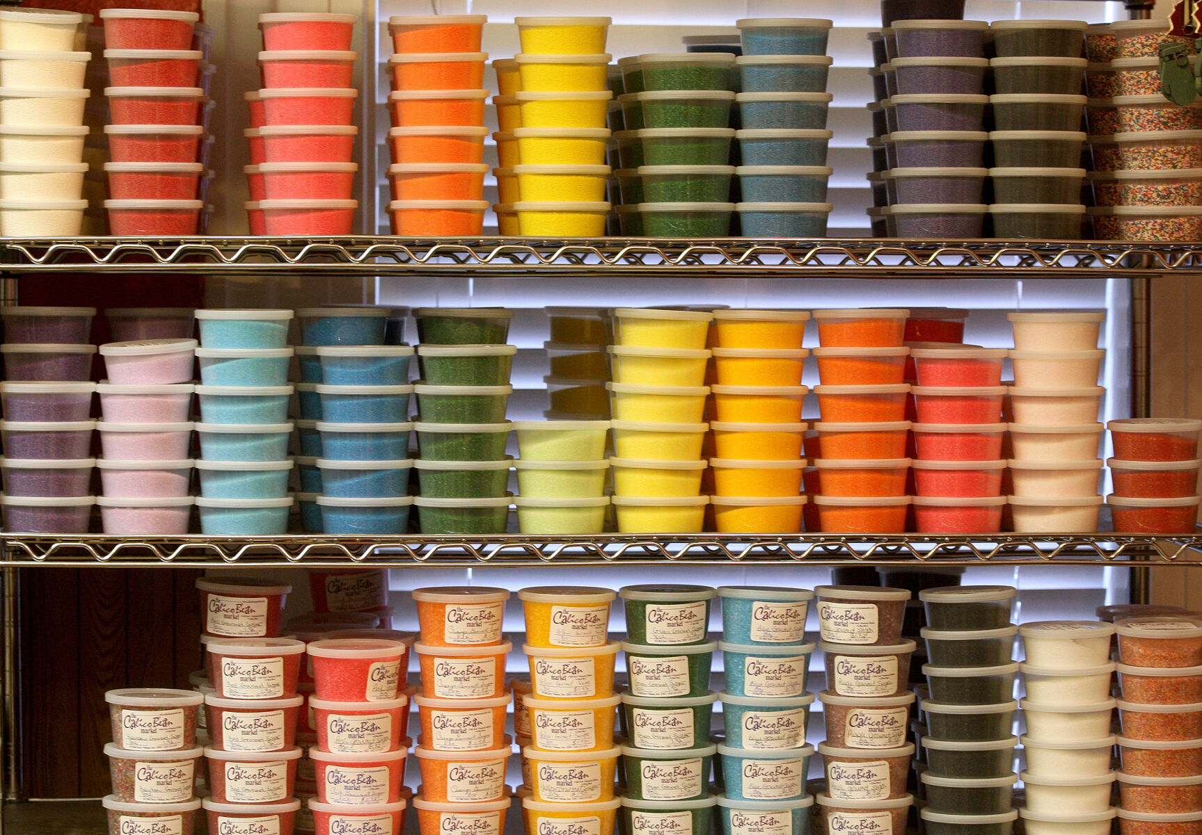 An assortment of sugars and toppings are displayed at The Calico Bean Market.    PHOTO CREDIT: File photo