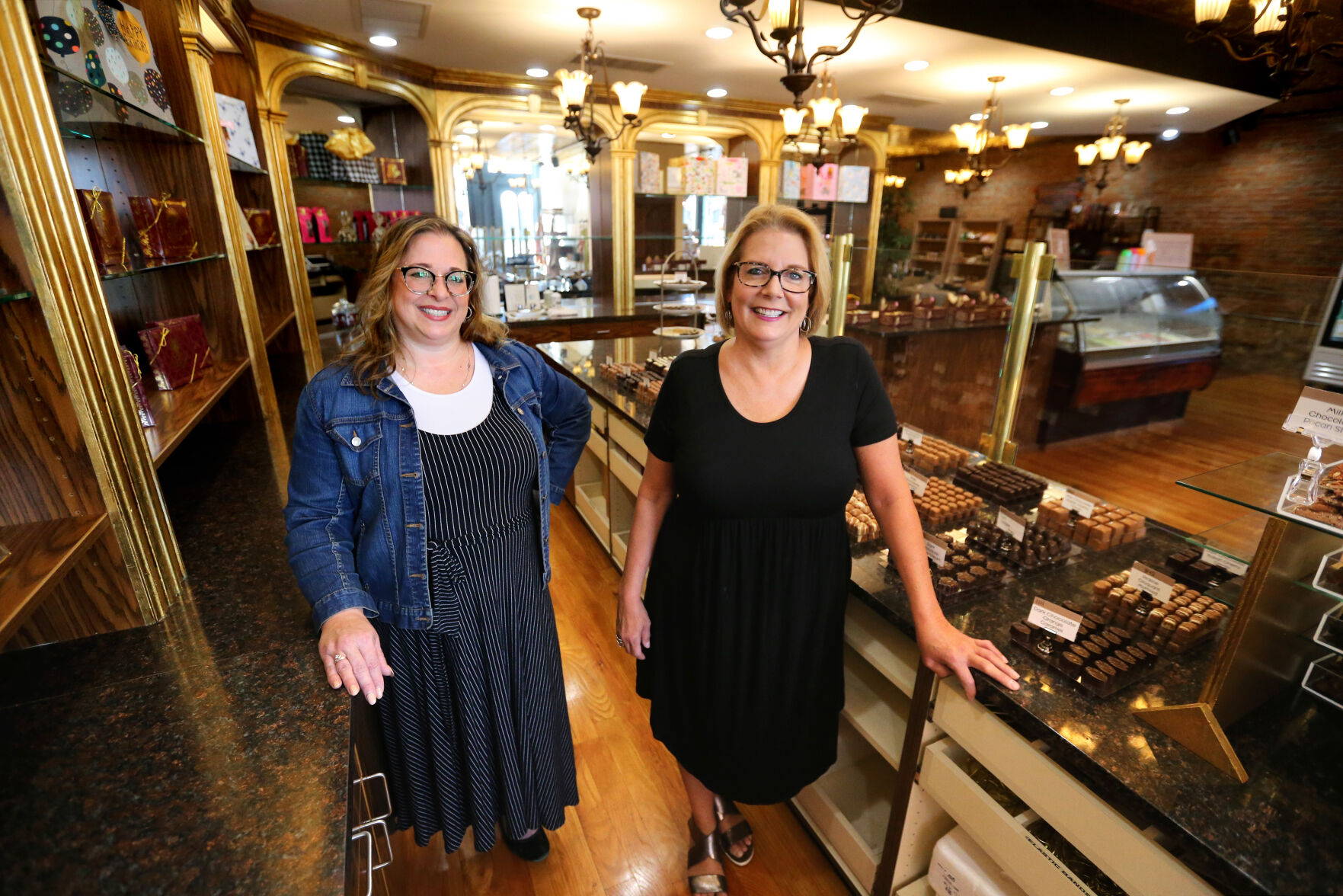 Owner Jennifer McCoy (left) and Manager Sharon Coleman stand at Sorpresa Gelato, Chocolate and Gifts.    PHOTO CREDIT: File photo