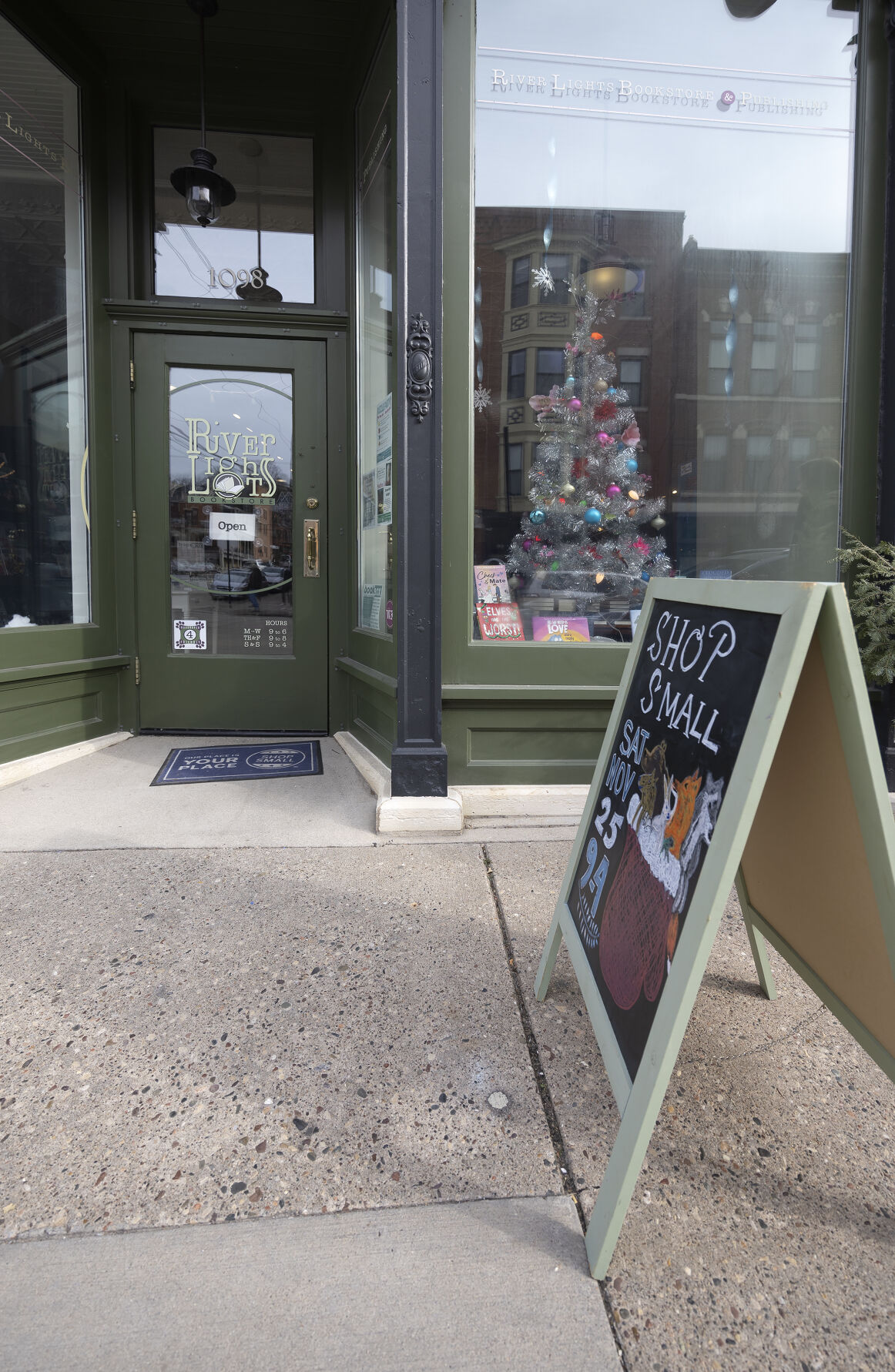 Exterior and “Shop Small” sign at River Lights Bookstore in Dubuque.    PHOTO CREDIT: File photo