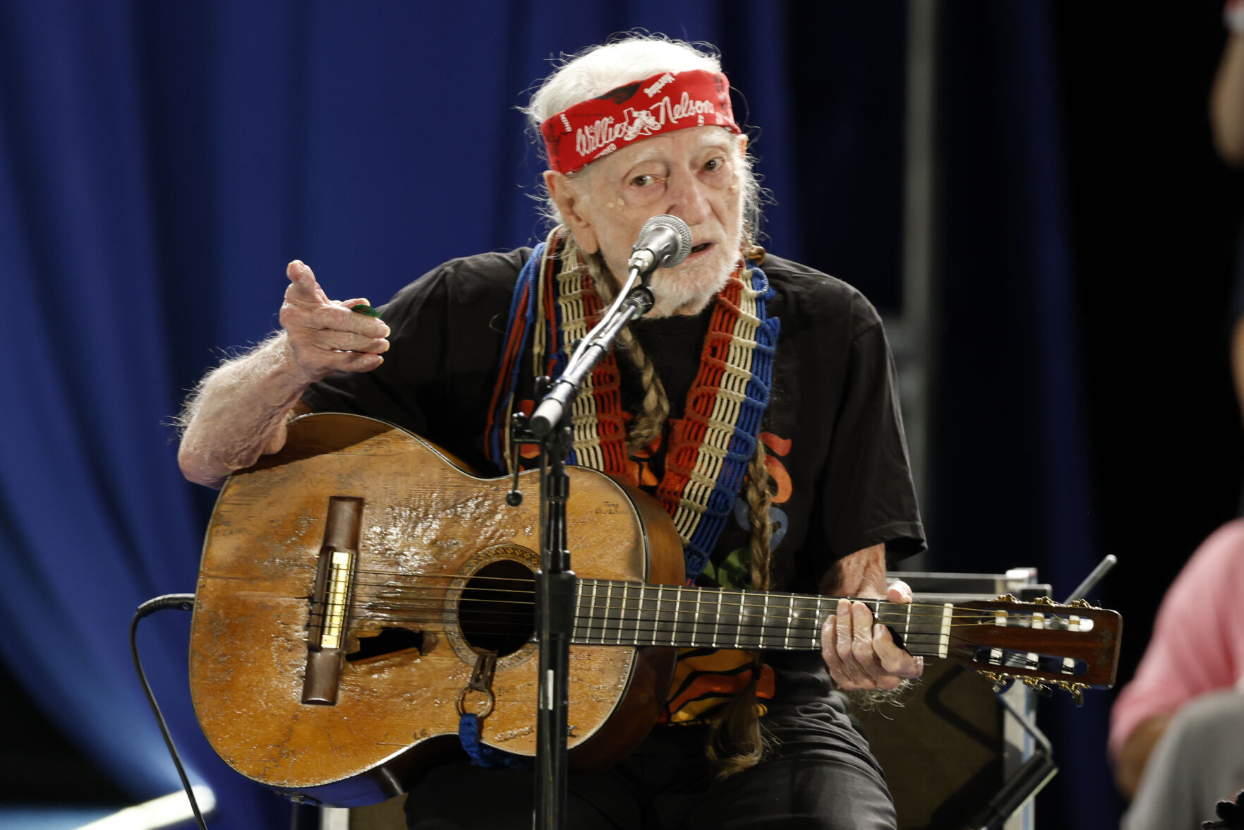 <p>Willie Nelson performs during a campaign rally for Democratic presidential nominee Vice President Kamala Harris, Friday, Oct. 25, 2024, in Houston. (AP Photo/Annie Mulligan)</p>   PHOTO CREDIT: Annie Mulligan - freelancer, ASSOCIATED PRESS