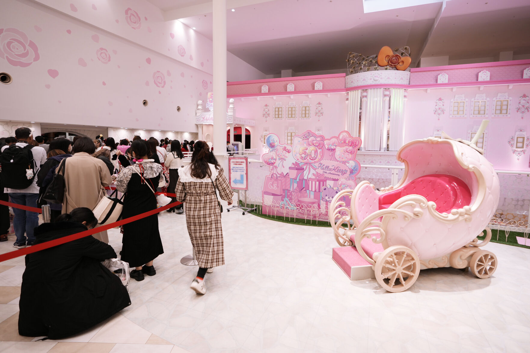 <p>Hello Kitty fans wait in line before meeting to greet her and having their photos taken with her during her 50th birth anniversary at Sanrio Puroland in Tama, a western suburb of Tokyo, Japan, Friday, Nov. 1, 2024. (AP Photo/Hiro Komae)</p>   PHOTO CREDIT: Hiro Komae - staff, ASSOCIATED PRESS