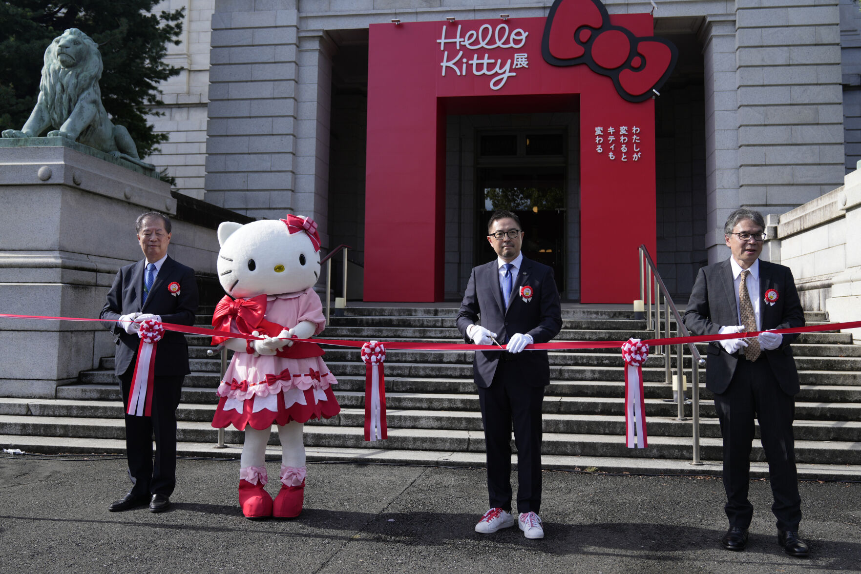 <p>Hello Kitty, second from left, with Makoto Fujiwara, executive director of the Tokyo National Museum, left, Sanrio Senior Managing Director, Yasuyuki Otsuka, second right, and Keiichi Sawa, right, managing director of Nippon TV, attends the opening ceremony of the exhibition "As I change, so does she," marking the 50th anniversary of Hello Kitty at the Tokyo National Museum in Tokyo Wednesday, Oct. 30, 2024. (AP Photo/Shuji Kajiyama)</p>   PHOTO CREDIT: Shuji Kajiyama - staff, ASSOCIATED PRESS