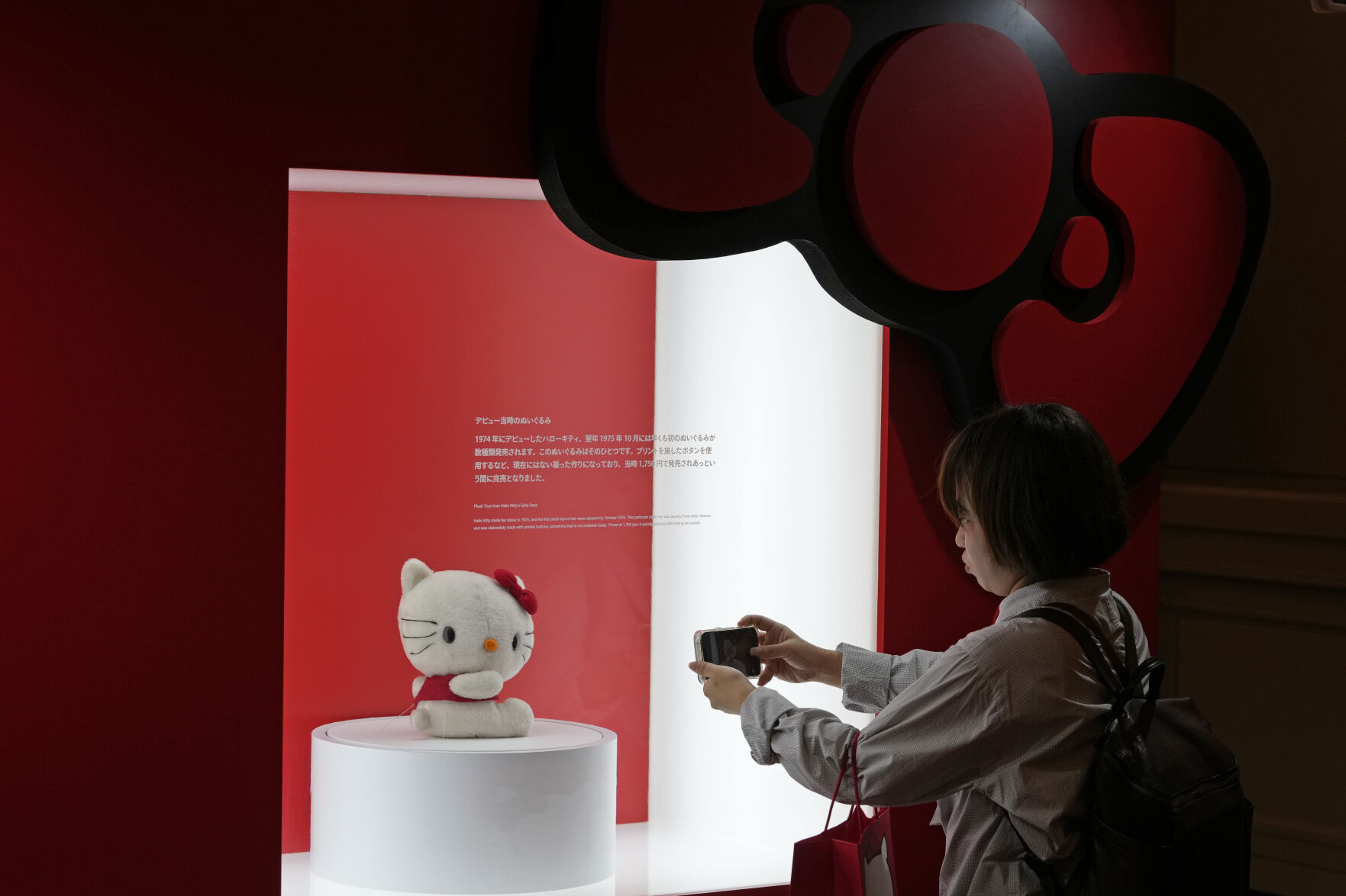 <p>A visitor takes a picture of a Hello Kitty doll at the exhibition "As I change, so does she," marking the 50th anniversary of Hello Kitty at the Tokyo National Museum in Tokyo Wednesday, Oct. 30, 2024. (AP Photo/Shuji Kajiyama)</p>   PHOTO CREDIT: Shuji Kajiyama - staff, ASSOCIATED PRESS