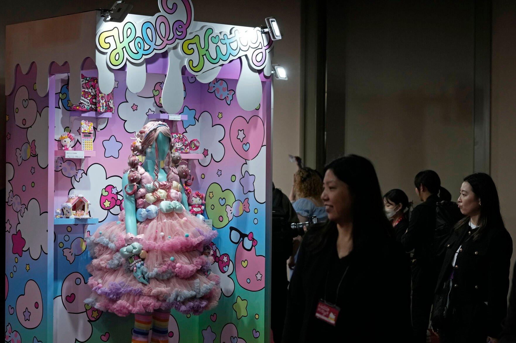 <p>Visitors look at giant Hello Kitty decorations at the exhibition "As I change, so does she," marking the 50th anniversary of Hello Kitty at the Tokyo National Museum in Tokyo Wednesday, Oct. 30, 2024. (AP Photo/Shuji Kajiyama)</p>   PHOTO CREDIT: Shuji Kajiyama - staff, ASSOCIATED PRESS