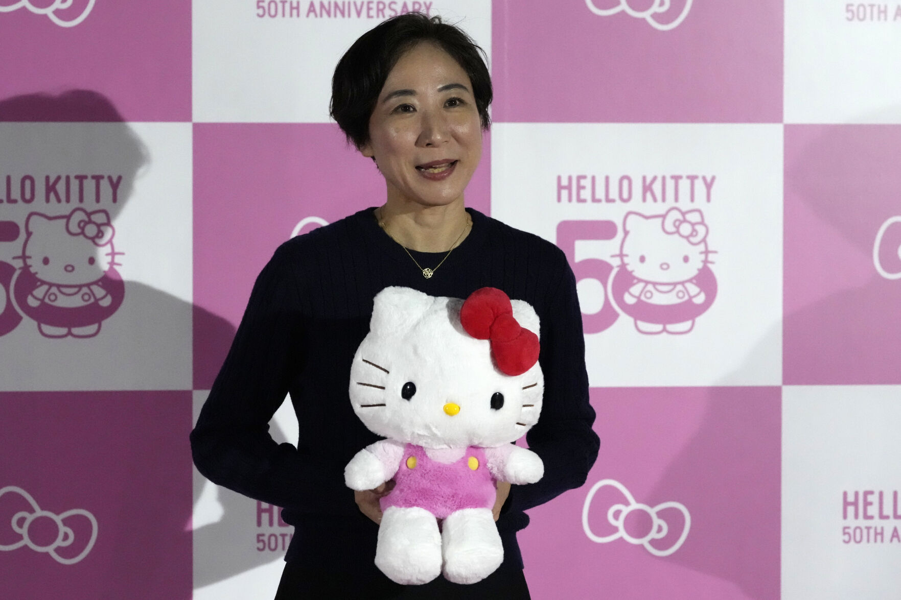 <p>Yuko Akiyama, one of the directors at Sanrio, speaks to the media during the exhibition "As I change, so does she," marking the 50th anniversary of Hello Kitty at the Tokyo National Museum in Tokyo Wednesday, Oct. 30, 2024. (AP Photo/Shuji Kajiyama)</p>   PHOTO CREDIT: Shuji Kajiyama - staff, ASSOCIATED PRESS