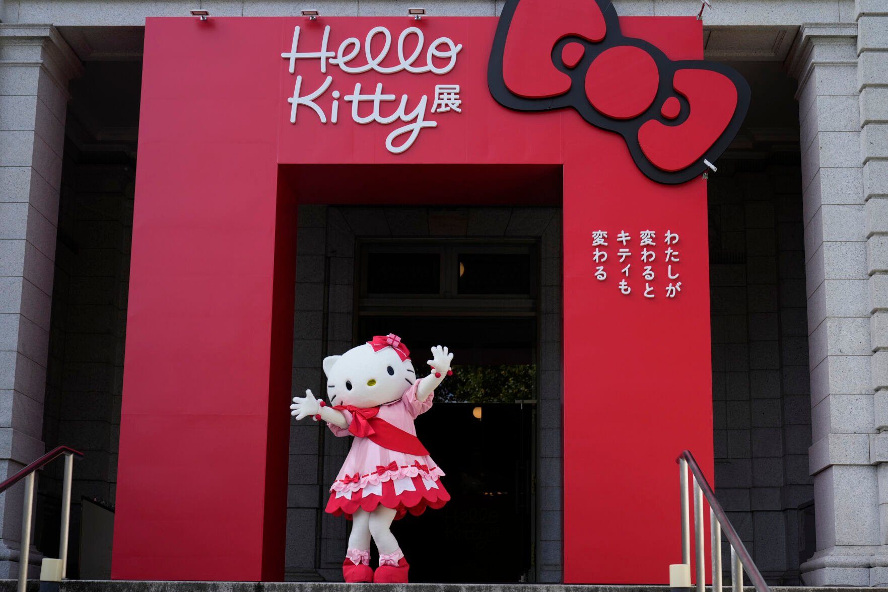 <p>Hello Kitty waves as she appears to attend the opening ceremony of the exhibition "As I change, so does she," marking the 50th anniversary of Hello Kitty at the Tokyo National Museum in Tokyo Wednesday, Oct. 30, 2024. (AP Photo/Shuji Kajiyama)</p>   PHOTO CREDIT: Shuji Kajiyama - staff, ASSOCIATED PRESS