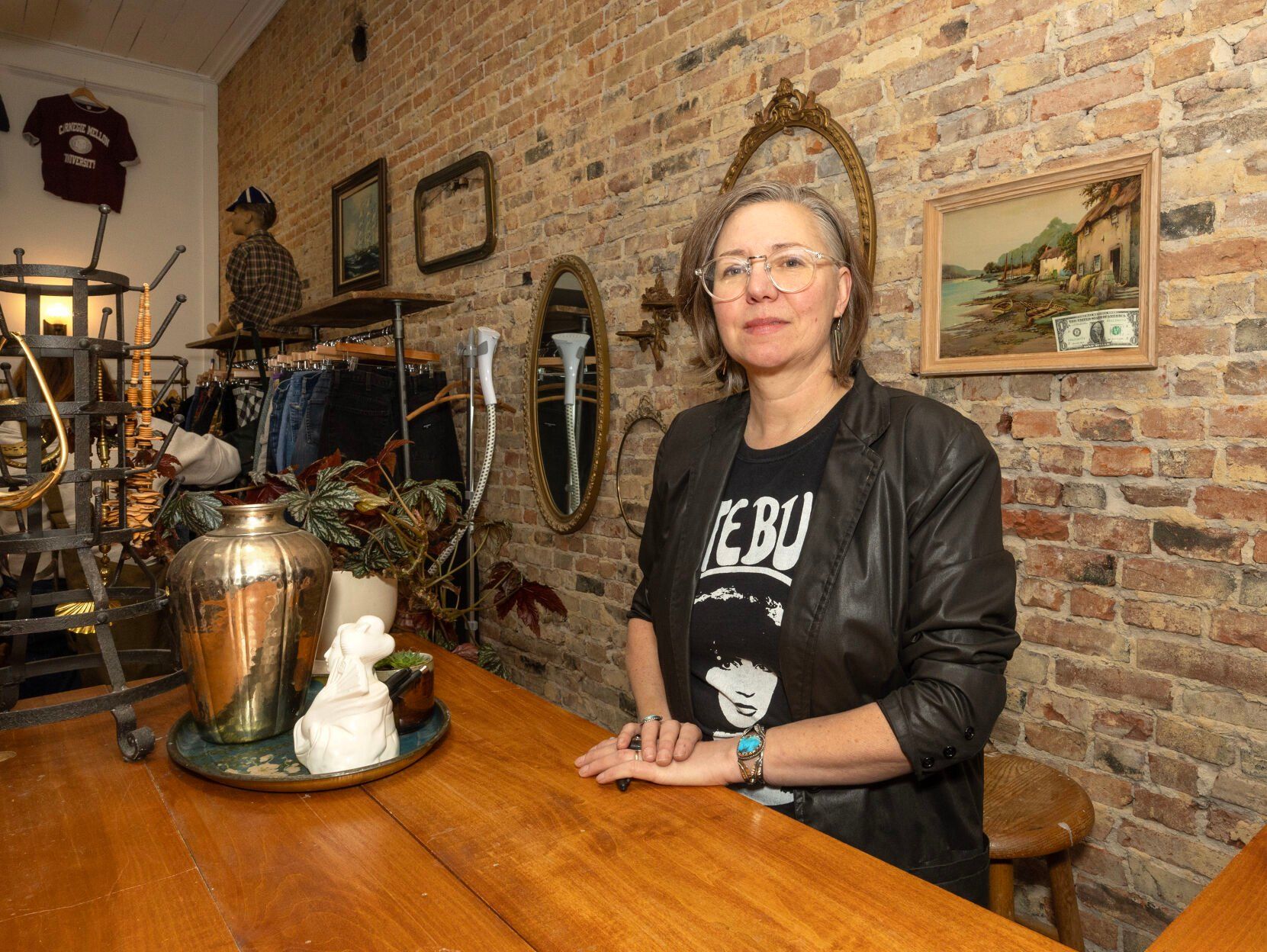 Lorraine Reynolds recently opened Moonage Daydream, a vintage clothing store, in Platteville, Wis.    PHOTO CREDIT: Stephen Gassman