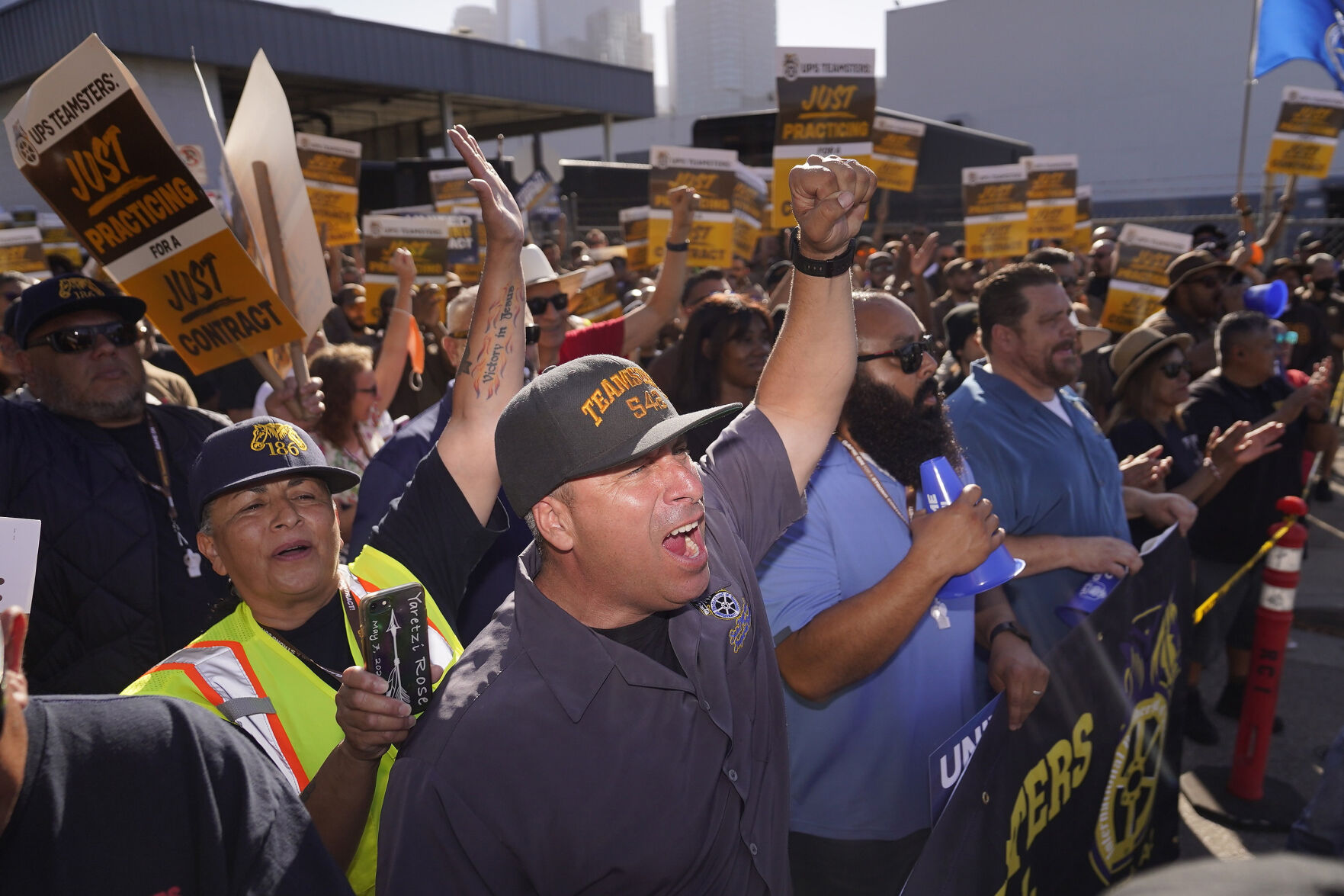 <p>FILE - Teamsters and workers hold a rally in downtown Los Angeles, July 19, 2023, as a deadline neared in negotiations between the union and United Parcel Service. (AP Photo/Damian Dovarganes)</p>   PHOTO CREDIT: Damian Dovarganes - staff, ASSOCIATED PRESS