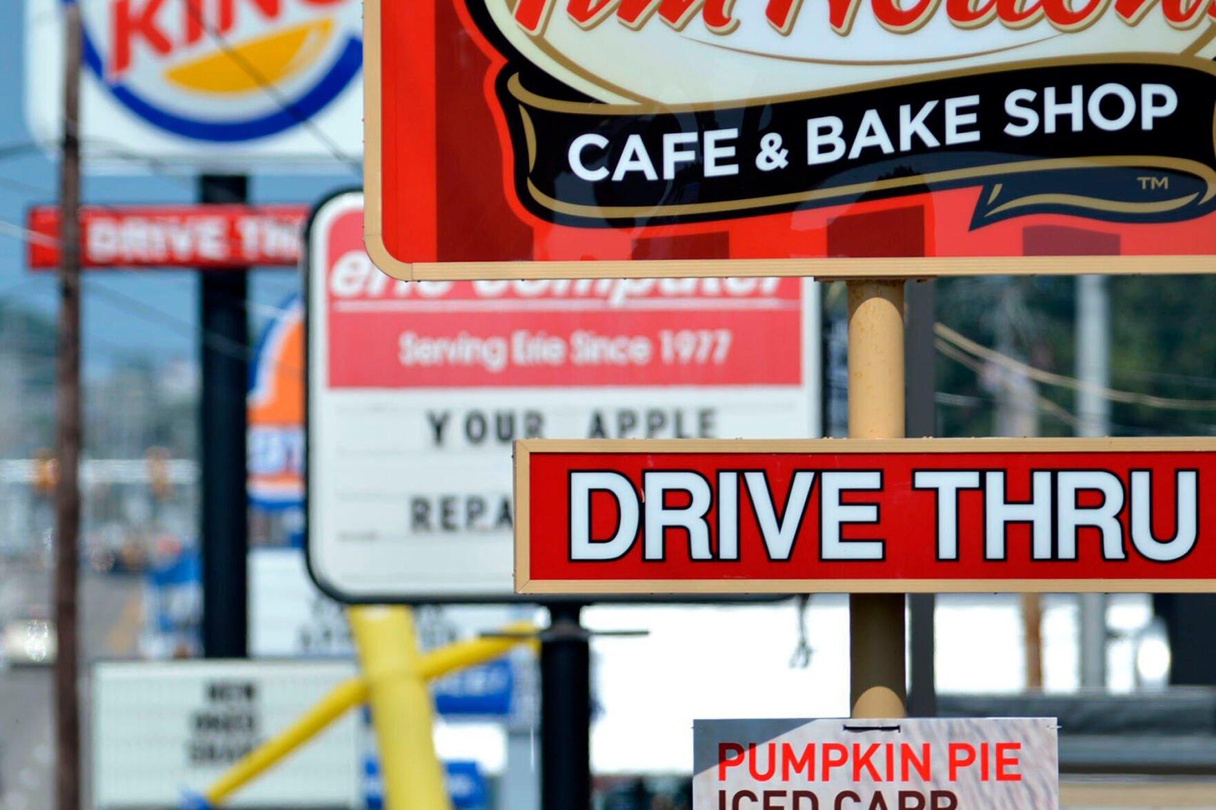 <p>FILE - Fast food restaurant signs line Peach Street in Erie, Pa., Aug. 26, 2014. (Christopher Millette/Erie Times-News via AP, File)</p>   PHOTO CREDIT: Christopher Millette 