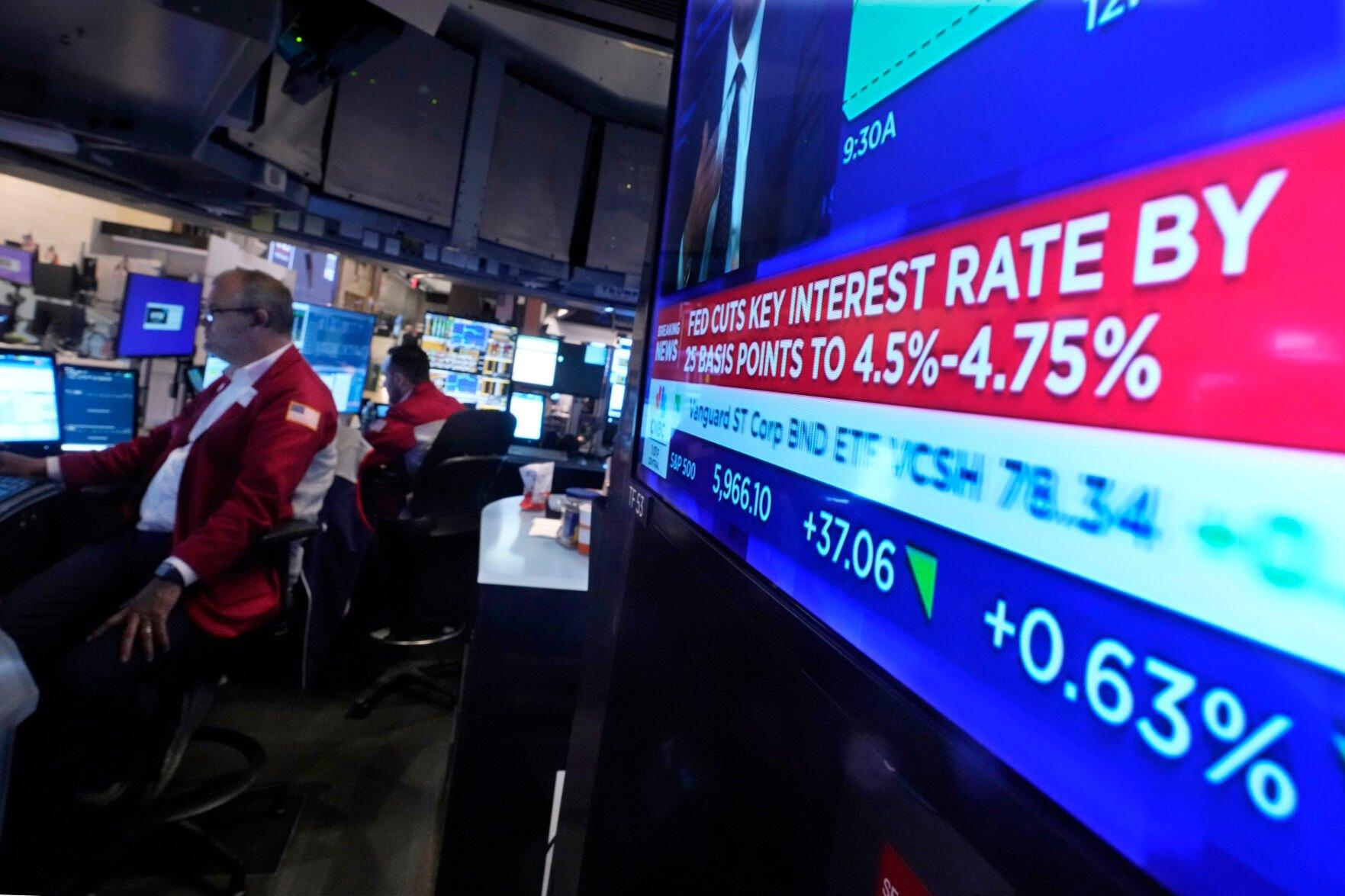 <p>A screen at a trading post on the floor of the New York Stock Exchange displays the Federal Reserve interest rate decision, Thursday, Nov. 7, 2024. (AP Photo/Richard Drew)</p>   PHOTO CREDIT: Richard Drew - staff, ASSOCIATED PRESS