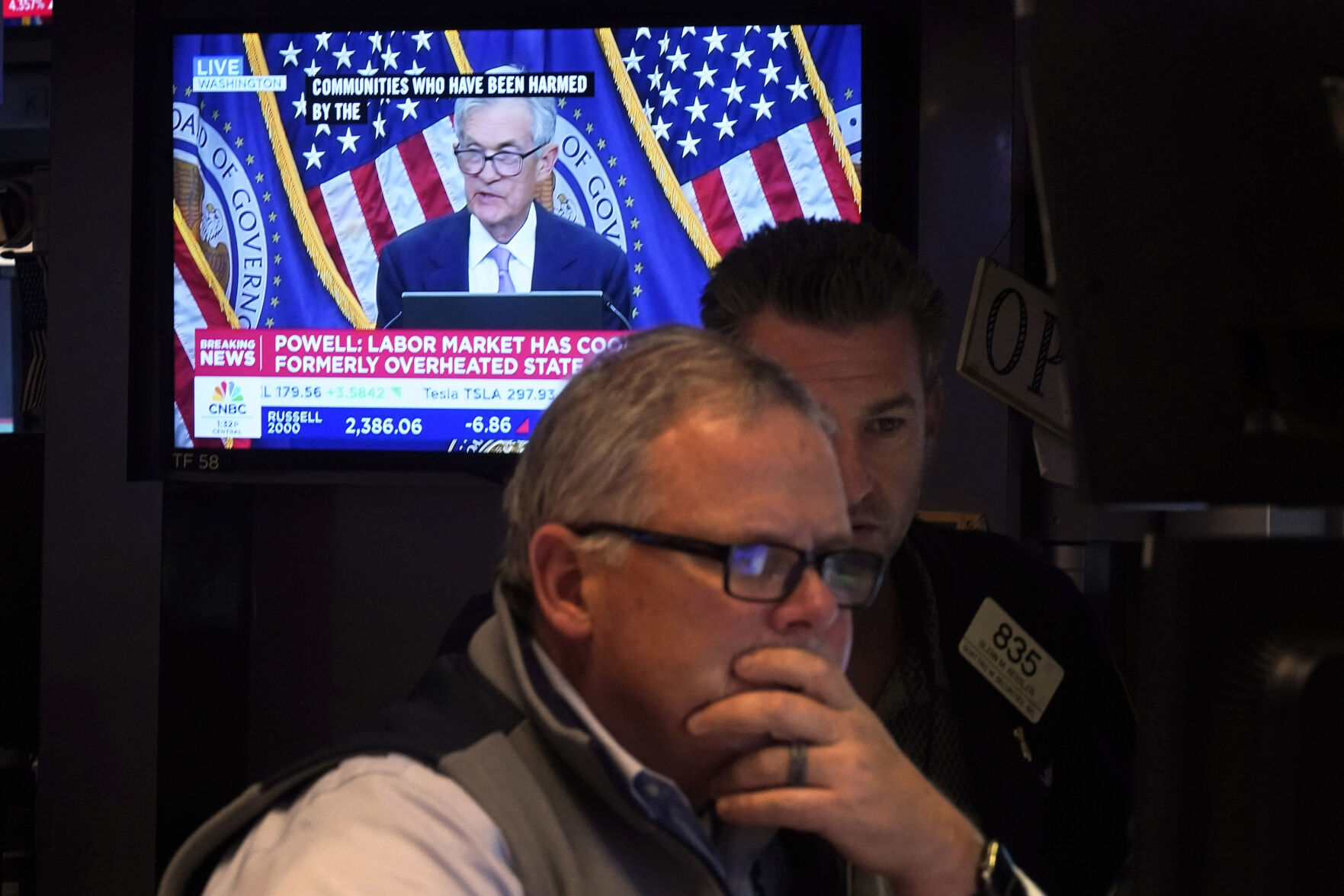 <p>A pair of traders work on the floor of the New York Stock Exchange, Thursday, Nov. 7, 2024, in New York, as Federal Reserve Chair Jerome Powell news conference in Washington is displayed on a monitor. (AP Photo/Richard Drew)</p>   PHOTO CREDIT: Richard Drew - staff, ASSOCIATED PRESS