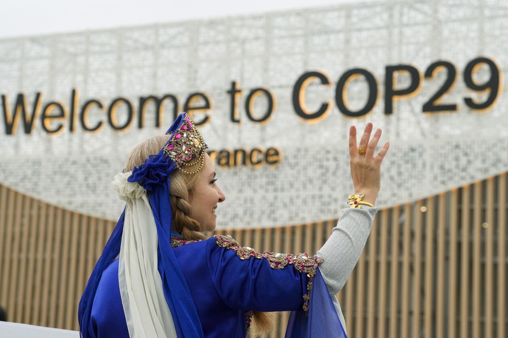 <p>A women demonstrates with a sign on veganism at the COP29 U.N. Climate Summit, Tuesday, Nov. 12, 2024, in Baku, Azerbaijan. (AP Photo/Peter Dejong)</p>   PHOTO CREDIT: Peter Dejong - staff, ASSOCIATED PRESS