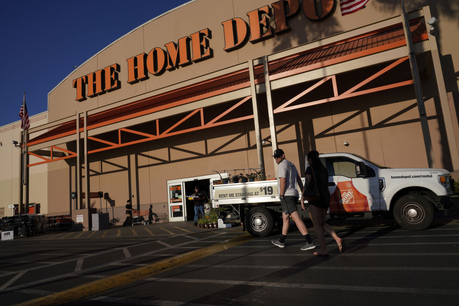 <p>FILE - Customers arrive at The Home Depot store in the Van Nuys section of Los Angeles on July 24, 2023. (AP Photo/Richard Vogel, File)</p>   PHOTO CREDIT: Richard Vogel 