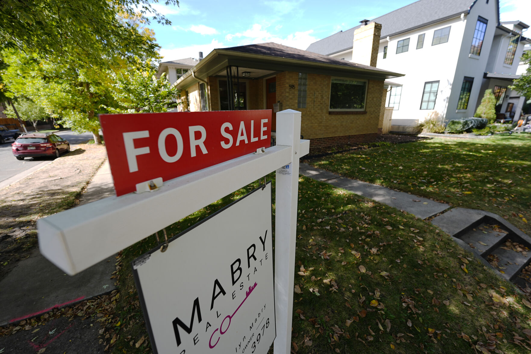 <p>FILE - A sale sign stands outside a home on the market Thursday, Oct. 17, 2024, in the east Washington Park neighborhood of Denver. (AP Photo/David Zalubowski, File)</p>   PHOTO CREDIT: David Zalubowski 