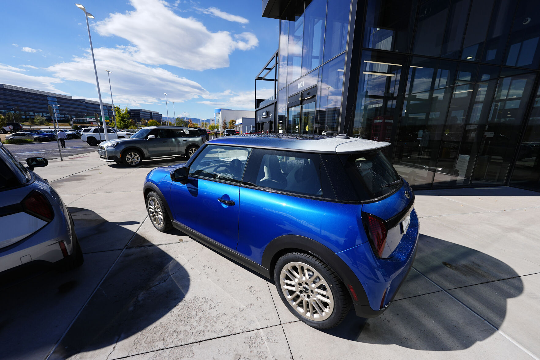 <p>FILE - Unsold 2025 Countryman sports-utility vehicles and Cooper S hardtops sit on display at a Mini dealership Oct. 21, 2024, in Highlands Ranch, Colo. (AP Photo/David Zalubowski, File)</p>   PHOTO CREDIT: David Zalubowski - staff, ASSOCIATED PRESS