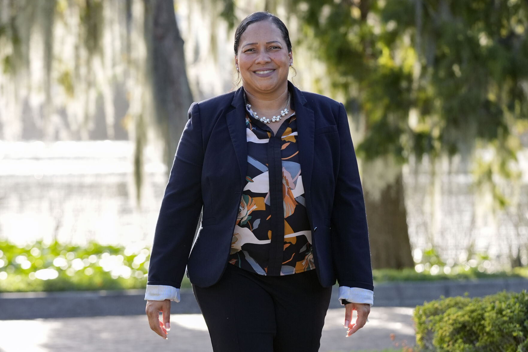 <p>Marisol Ortega, a Polk County resident that commutes to her job in Orlando walks at a park Thursday, Nov. 14, 2024, in Orlando, Fla. (AP Photo/John Raoux)</p>   PHOTO CREDIT: John Raoux - staff, ASSOCIATED PRESS