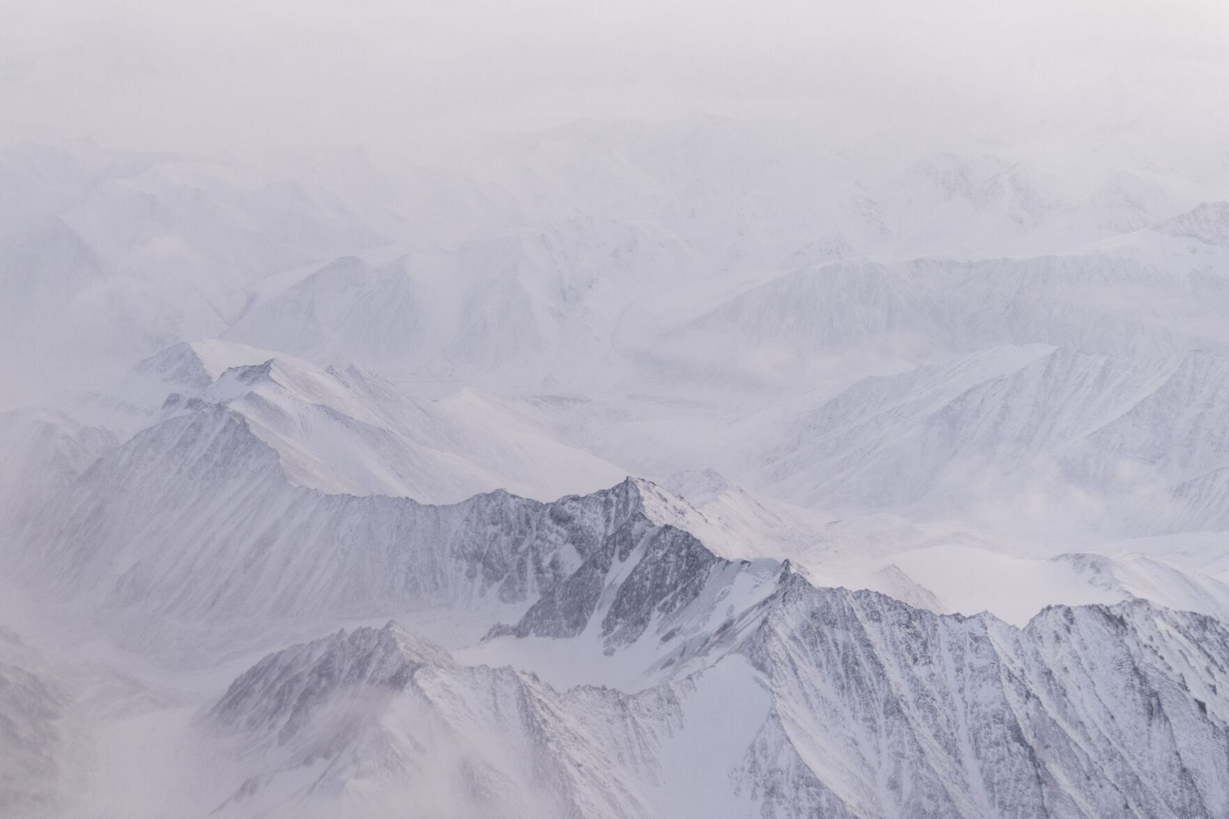 <p>Snow covers the mountains of the Brooks Range in the Arctic National Wildlife Refuge, Monday, Oct. 14, 2024, near Kaktovik, Alaska. (AP Photo/Lindsey Wasson)</p>   PHOTO CREDIT: Lindsey Wasson - staff, ASSOCIATED PRESS