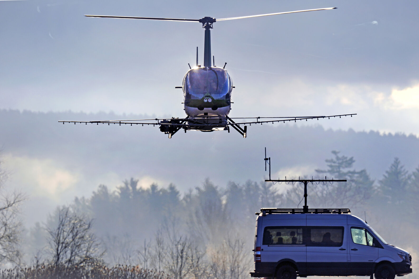 <p>A Rotor Technologies unmanned semi-autonomous helicopter flies away from a van containing a ground control pilot/operator during a test flight over Intervale Airport, Monday, Nov. 11, 2024, in Henniker, N.H. (AP Photo/Charles Krupa)</p>   PHOTO CREDIT: Charles Krupa 