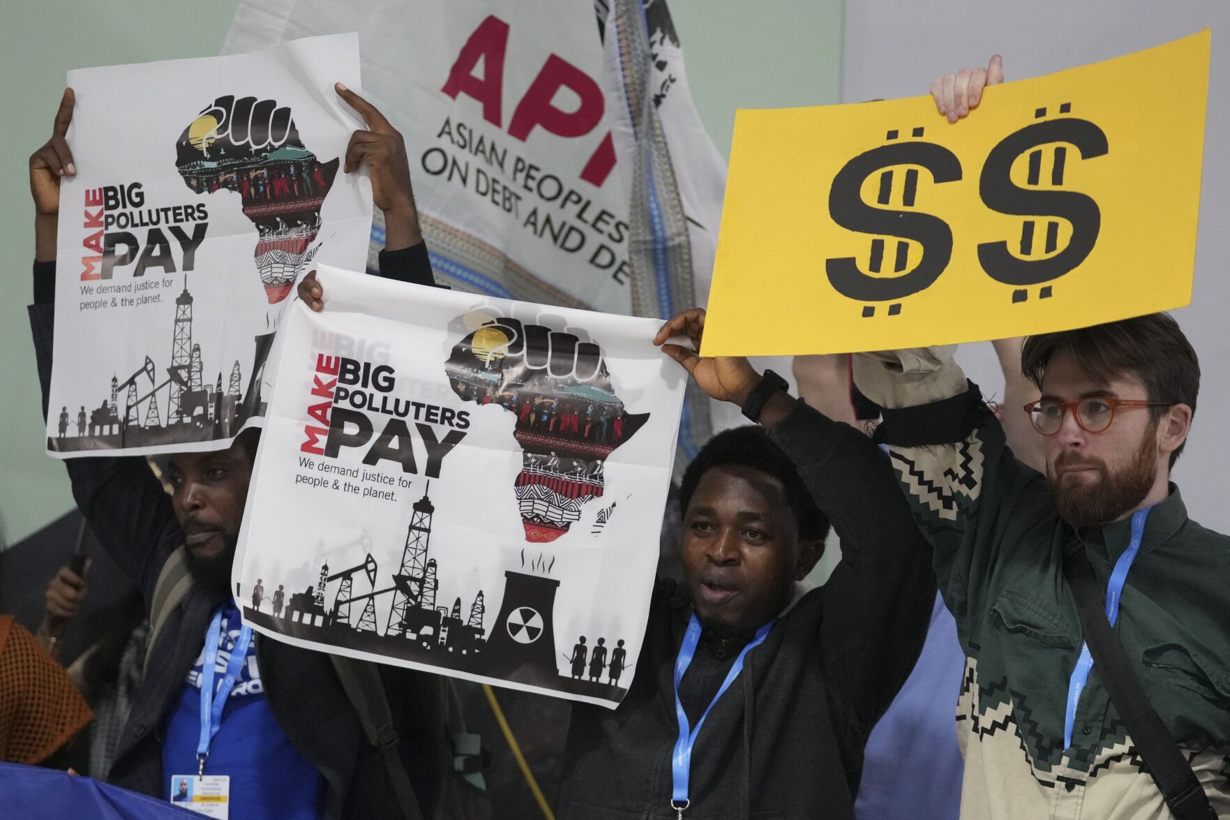 <p>Activists participate in a demonstration for climate finance at the COP29 U.N. Climate Summit, Tuesday, Nov. 19, 2024, in Baku, Azerbaijan. (AP Photo/Sergei Grits)</p>   PHOTO CREDIT: Sergei Grits - 