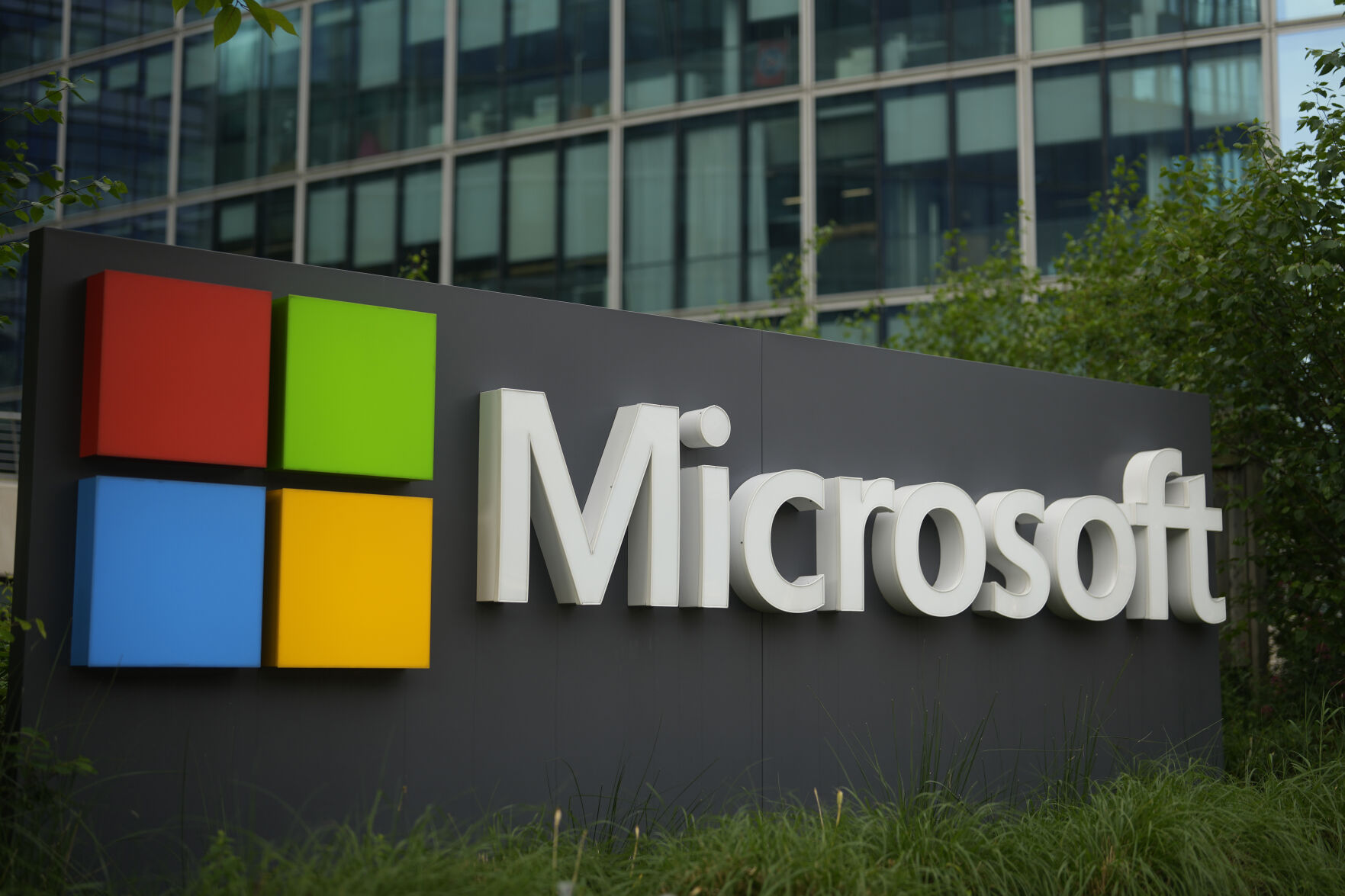 <p>FILE - The Microsoft logo is displayed outside its French headquarters in Issy-les-Moulineaux, outside Paris, May 13, 2024. (AP Photo/Thibault Camus, File)</p>   PHOTO CREDIT: Thibault Camus 