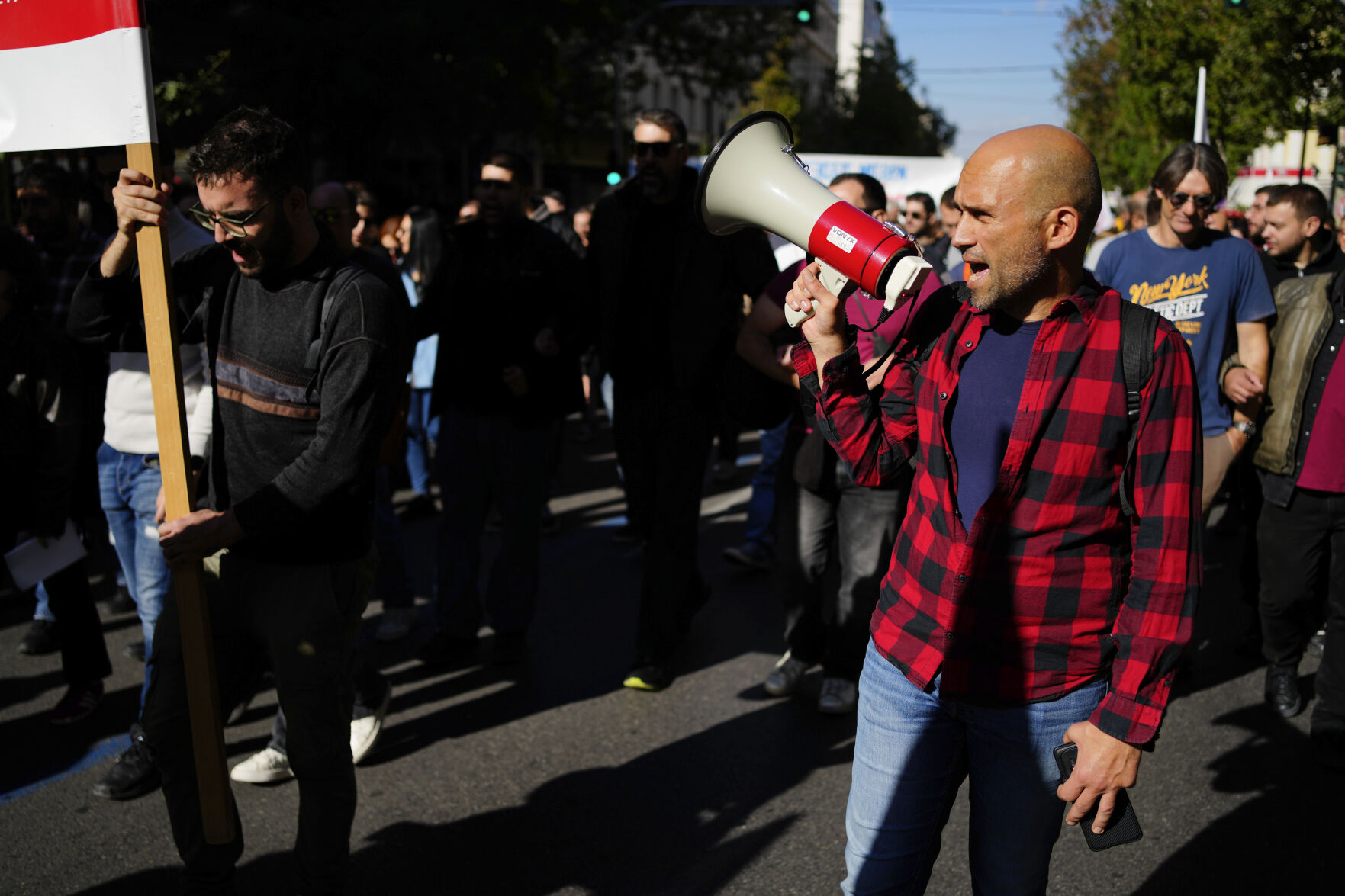 <p>Protesters take part in rally, during a nationwide general strike organized by private and public sector unions demanding for better wages, in Athens, Greece, Wednesday, Nov. 20, 2024. (AP Photo/Thanassis Stavrakis)</p>   PHOTO CREDIT: Thanassis Stavrakis - staff, ASSOCIATED PRESS