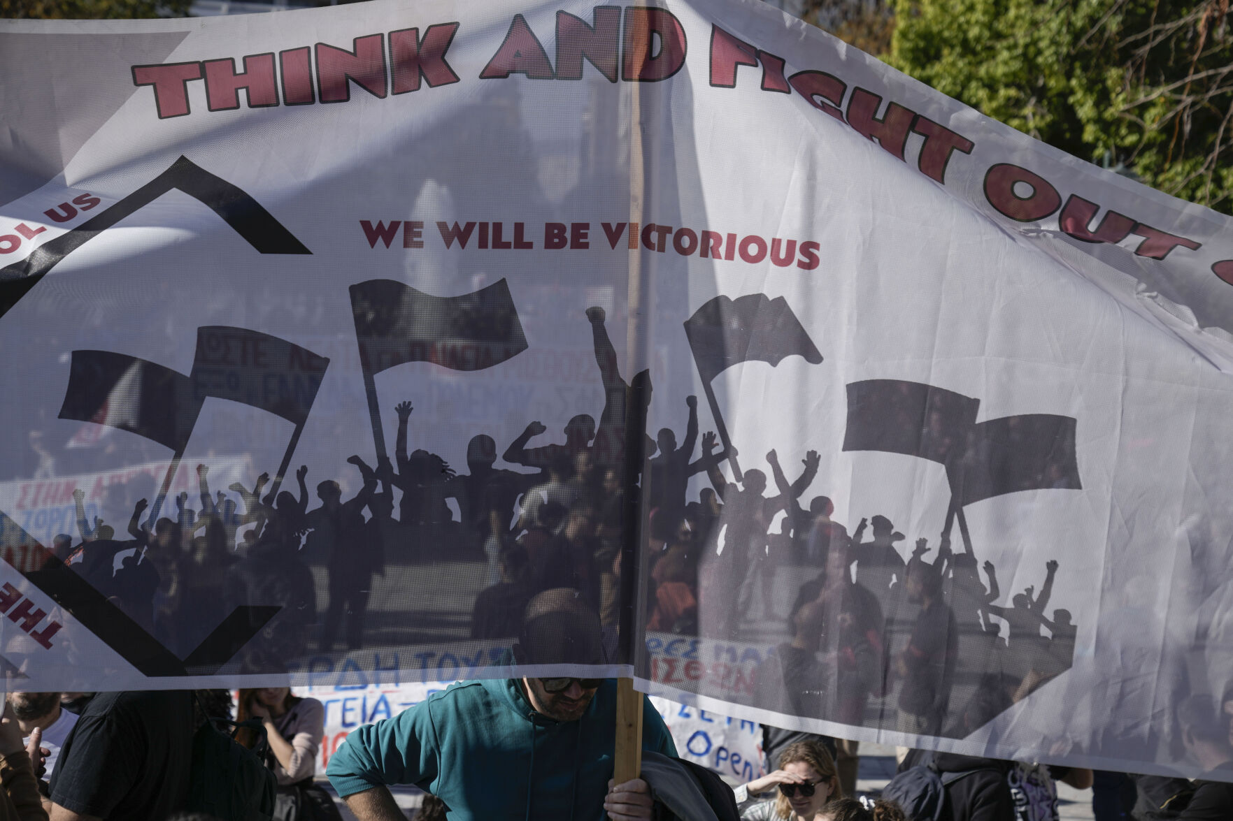 <p>Protesters take part in rally, during a nationwide general strike organized by private and public sector unions demanding for better wages, in Athens, Greece, Wednesday, Nov. 20, 2024. (AP Photo/Thanassis Stavrakis)</p>   PHOTO CREDIT: Thanassis Stavrakis - staff, ASSOCIATED PRESS