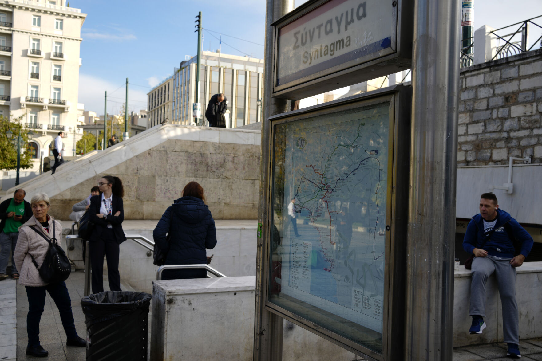 <p>Commuters stand outside the closed main metro Syntagma station, during a nationwide general strike organized by private and public sector unions demanding for better wages, in Athens, Greece, Wednesday, Nov. 20, 2024. (AP Photo/Thanassis Stavrakis)</p>   PHOTO CREDIT: Thanassis Stavrakis - staff, ASSOCIATED PRESS