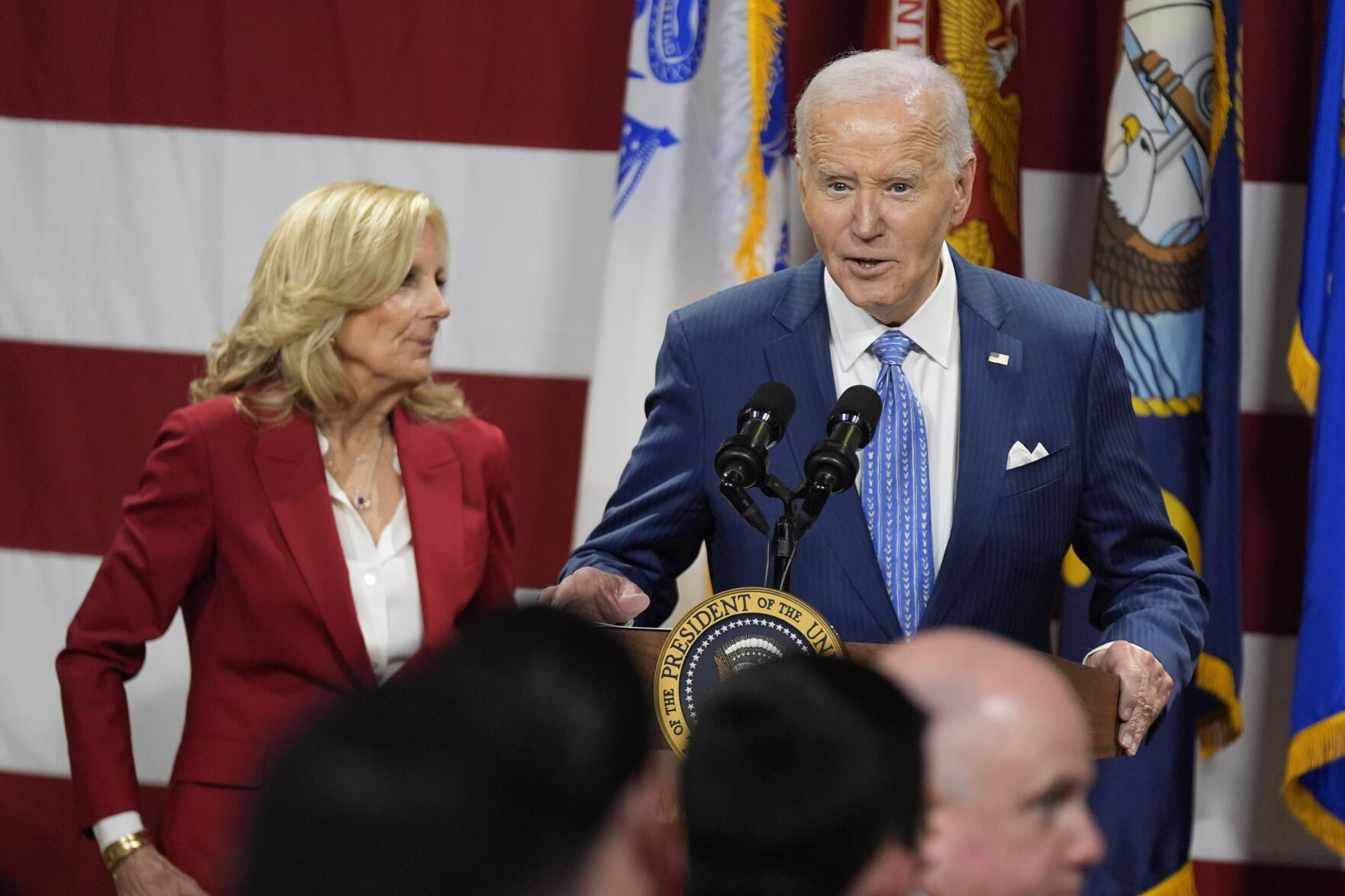 <p>President Joe Biden speaks as first lady Jill Biden looks on at a Friendsgiving event with service members and their families in the Staten Island borough of New York, Monday, Nov. 25 2024. (AP Photo/Manuel Balce Ceneta)</p>   PHOTO CREDIT: Manuel Balce Ceneta 