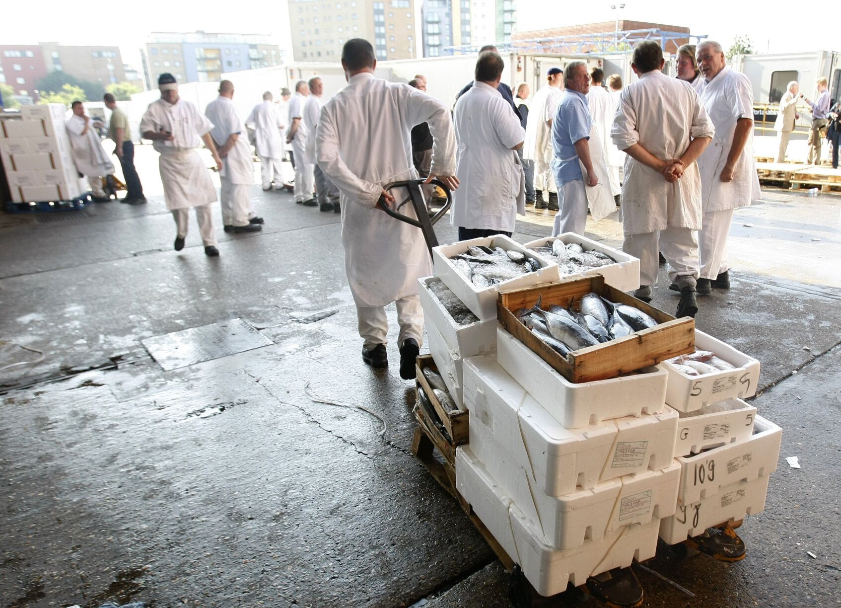 <p>FILE - Traditional porters at work at Billingsgate fish market in London, on Aug. 3, 2010. (AP Photo/Alastair Grant, File)</p>   PHOTO CREDIT: Alastair Grant - staff, ASSOCIATED PRESS