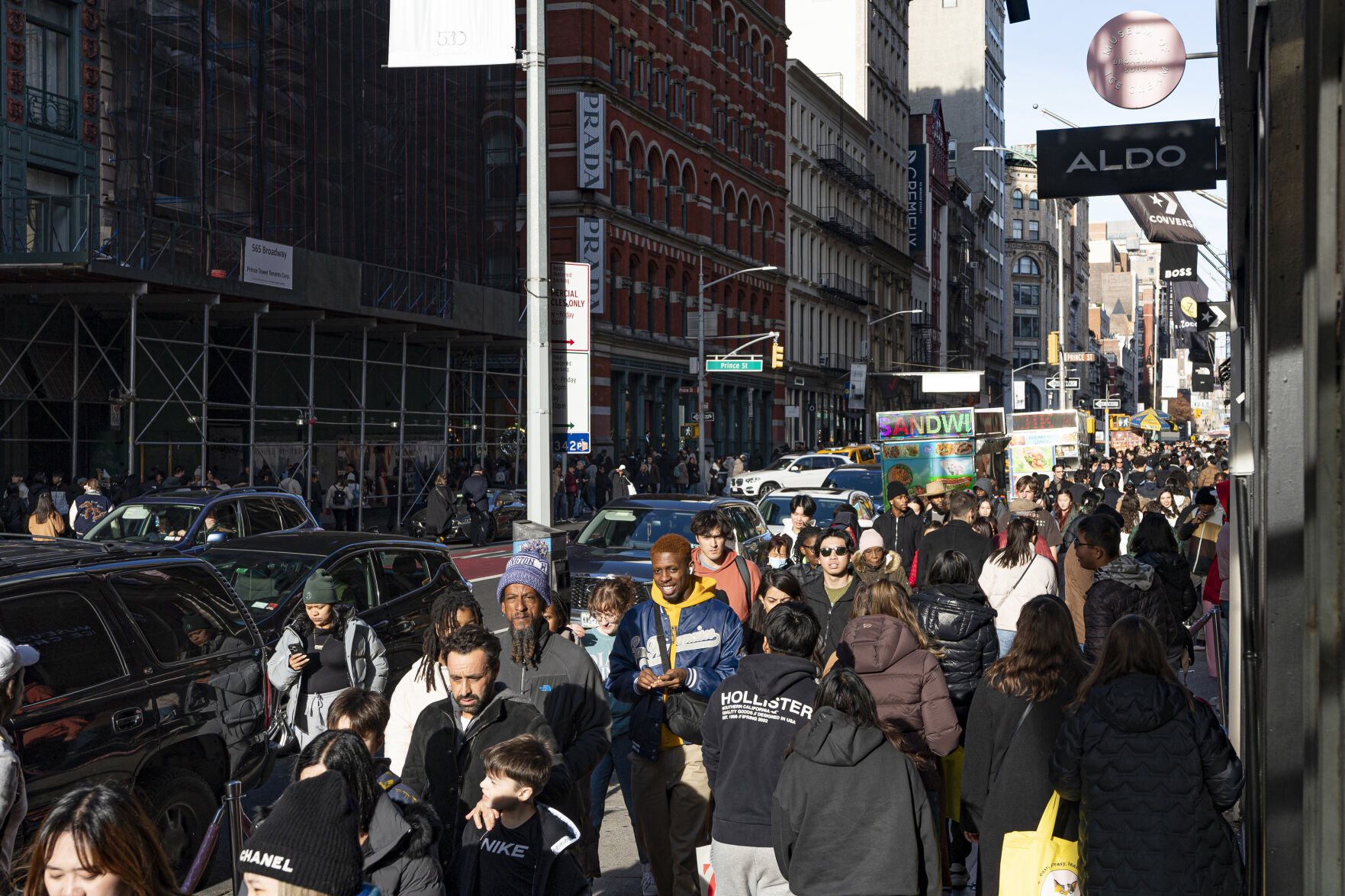 <p>FILE - Shoppers and others walk down a crowded sidewalk on Black Friday in the Soho neighborhood of New York, Nov. 24, 2023. (AP Photo/Peter K. Afriyie, File)</p>   PHOTO CREDIT: Peter K. Afriyie - staff, ASSOCIATED PRESS