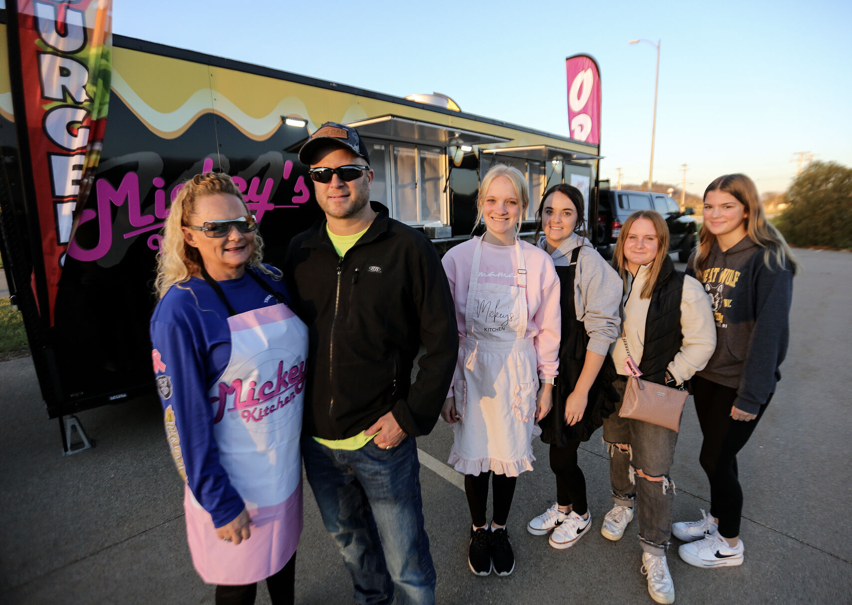 Mickey’s Kitchen owners Melissa Tott (left) and husband Eric along with family members Emma Whitmore, Marisah Keating, Paige Mohr and Izzy Tott.    PHOTO CREDIT: Dave Kettering