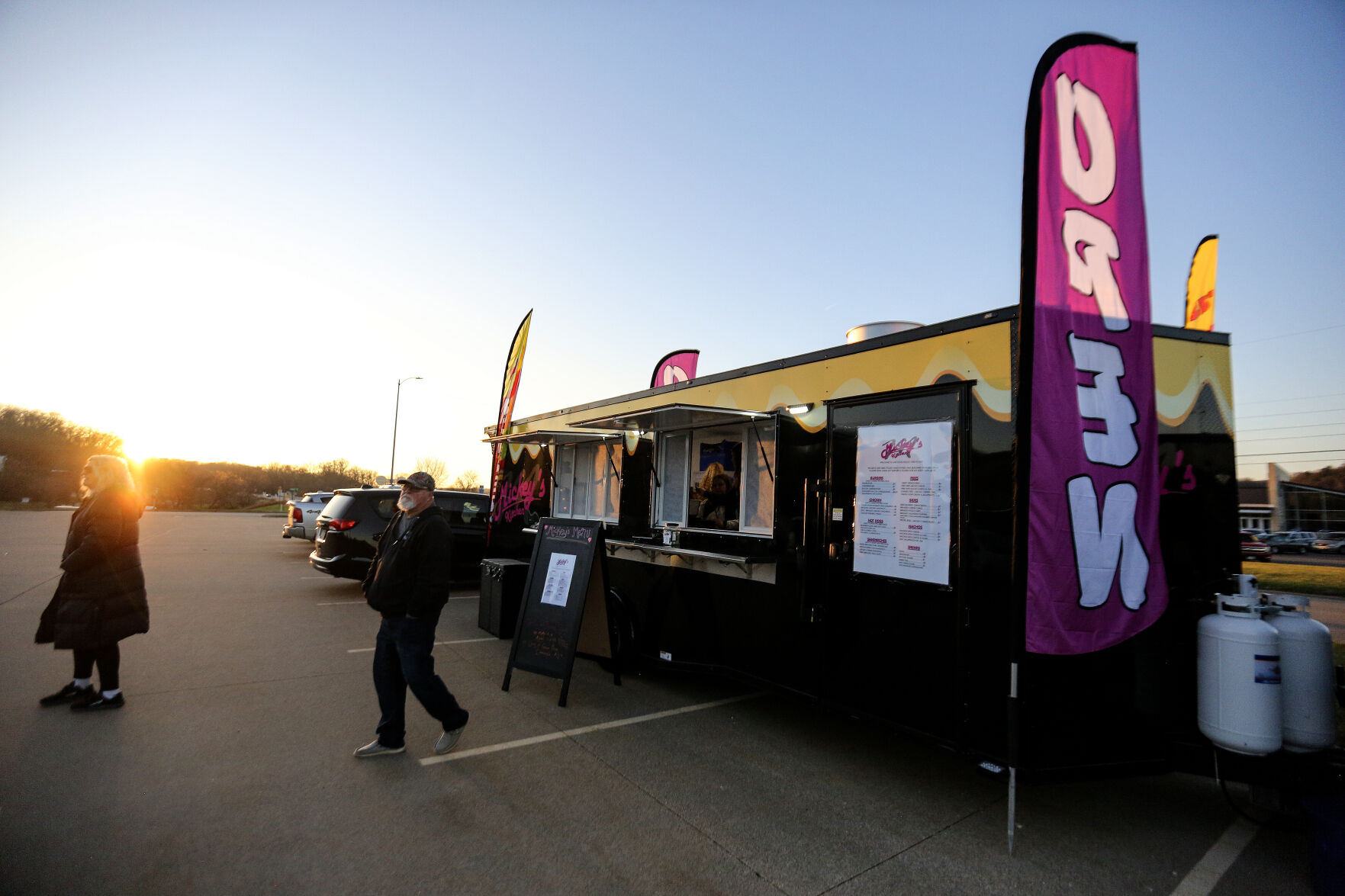 Mickey’s Kitchen food truck serves customers in Bellevue, Iowa.    PHOTO CREDIT: Dave Kettering