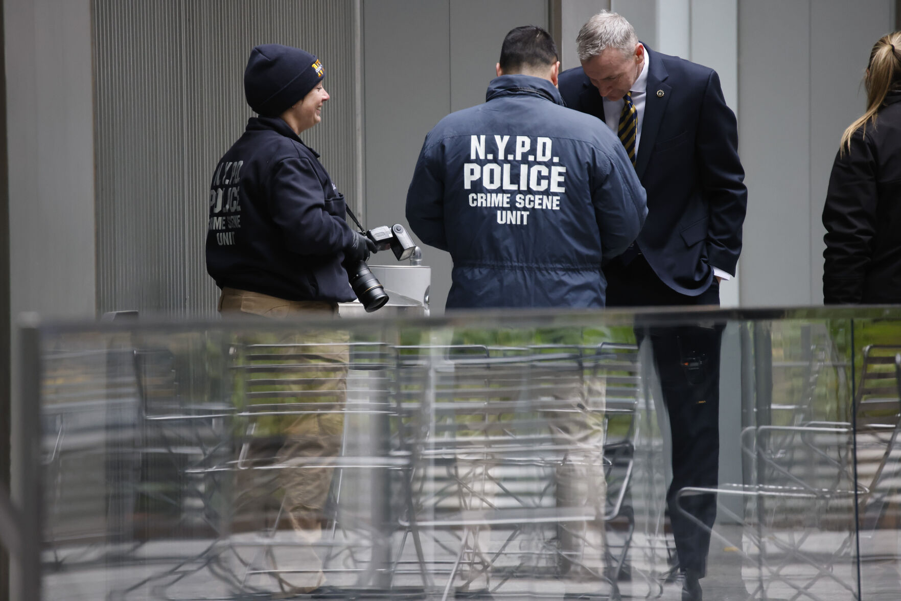 <p>Members of the New York police crime scene unit investigate the scene outside the Hilton Hotel in midtown Manhattan where Brian Thompson, the CEO of UnitedHealthcare, was fatally shot Wednesday, Wednesday, Dec. 4, 2024, in New York. (AP Photo/Stefan Jeremiah)</p>   PHOTO CREDIT: Stefan Jeremiah - freelancer, ASSOCIATED PRESS