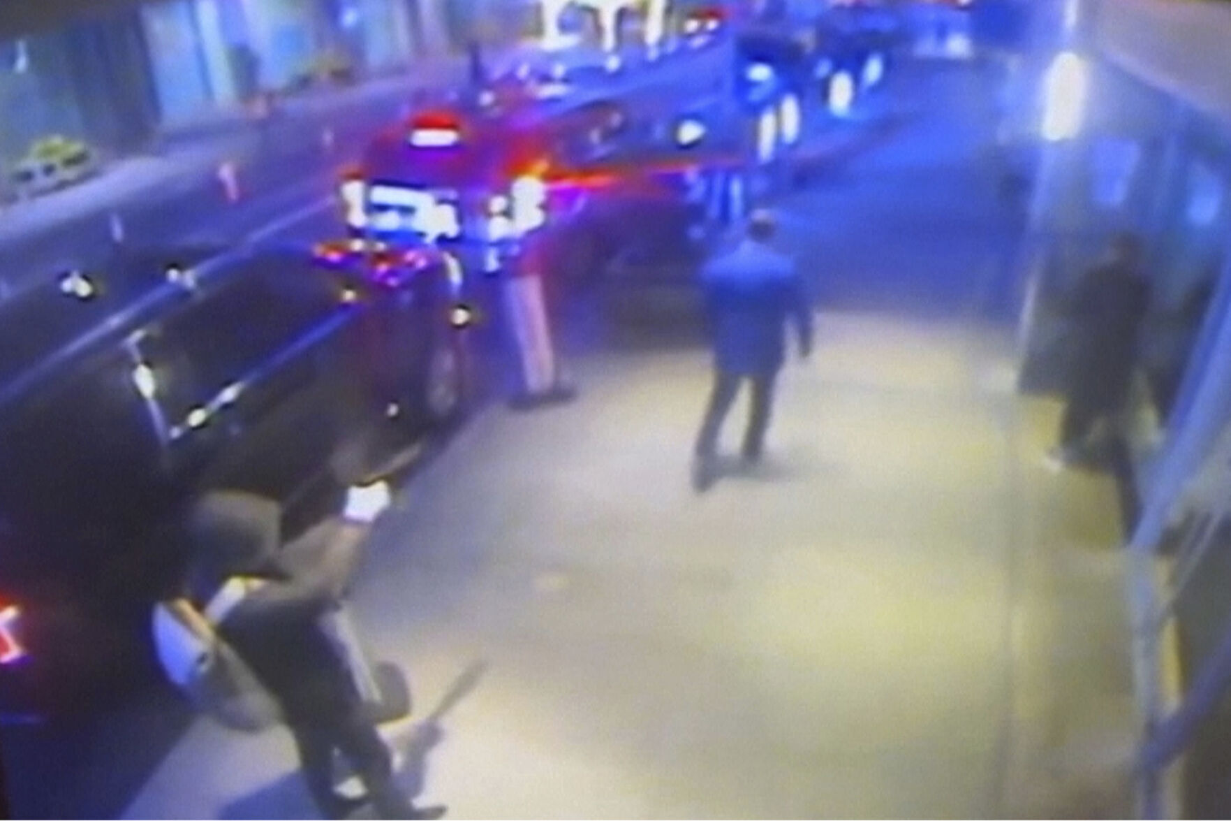 <p>This still image from surveillance video obtained by the Associated Press shows the suspect, left, sought in the the killing of UnitedHealthcare CEO Brian Thompson, center, outside a Manhattan hotel where the health insurer was holding an investor conference, Wednesday, Dec. 4, 2024. (AP Photo)</p>   PHOTO CREDIT: Uncredited - handout one time use, ASSOCIATED PRESS