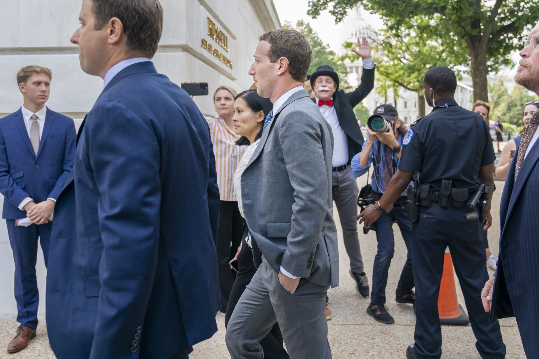 <p>FILE - Meta CEO Mark Zuckerberg passes media and a protester as he arrives for a closed-door gathering of leading tech CEOs to discuss the priorities and risks surrounding artificial intelligence, on Capitol Hill in Washington, on Sept. 13, 2023. (AP Photo/Jacquelyn Martin, File)</p>   PHOTO CREDIT: Jacquelyn Martin - staff, ASSOCIATED PRESS