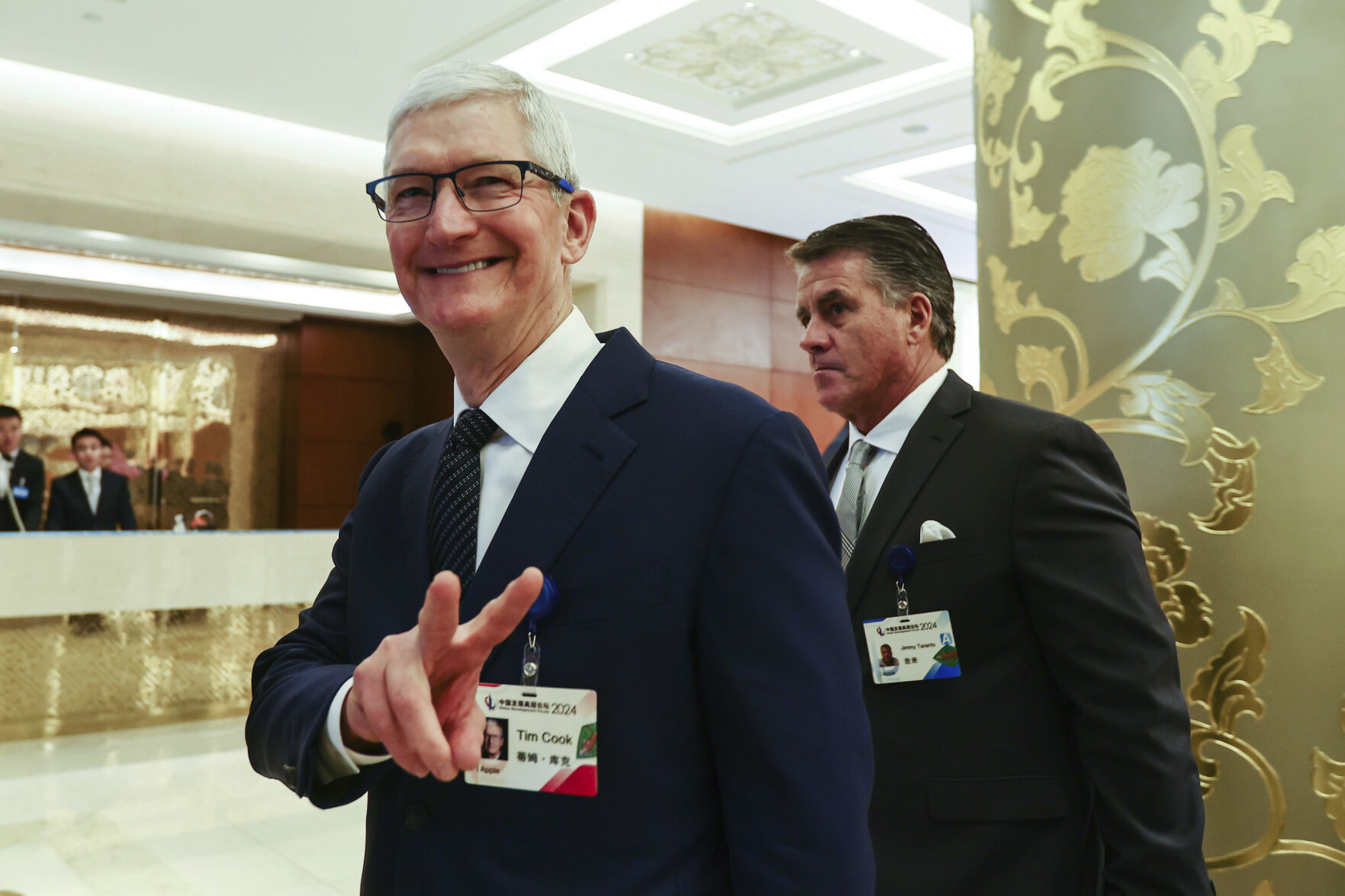 <p>FILE - Apple CEO Tim Cook reacts at the annual meeting of the China Development Forum at the Diaoyutai Guesthouse in Beijing, China, March 24, 2024. (Wu Hao/Pool Photo via AP, File)</p>   PHOTO CREDIT: Wu Hao - pool, ASSOCIATED PRESS