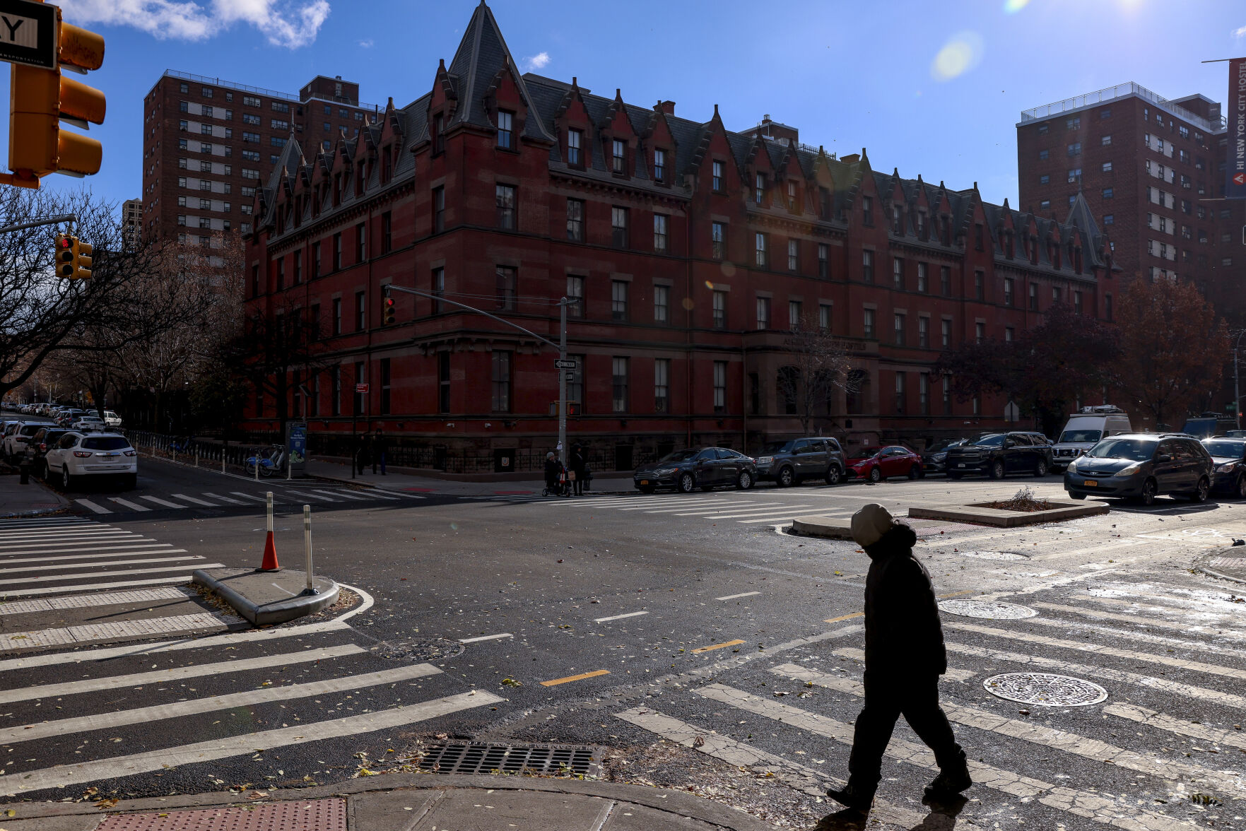 <p>A man crosses the street outside the HI New York City hostel, Thursday, Dec. 5, 2024, in New York, where police say the suspect in the killing of UnitedHealthcare CEO Brian Thompson may have stayed.(AP Photo/Yuki Iwamura)</p>   PHOTO CREDIT: Yuki Iwamura - freelancer, ASSOCIATED PRESS