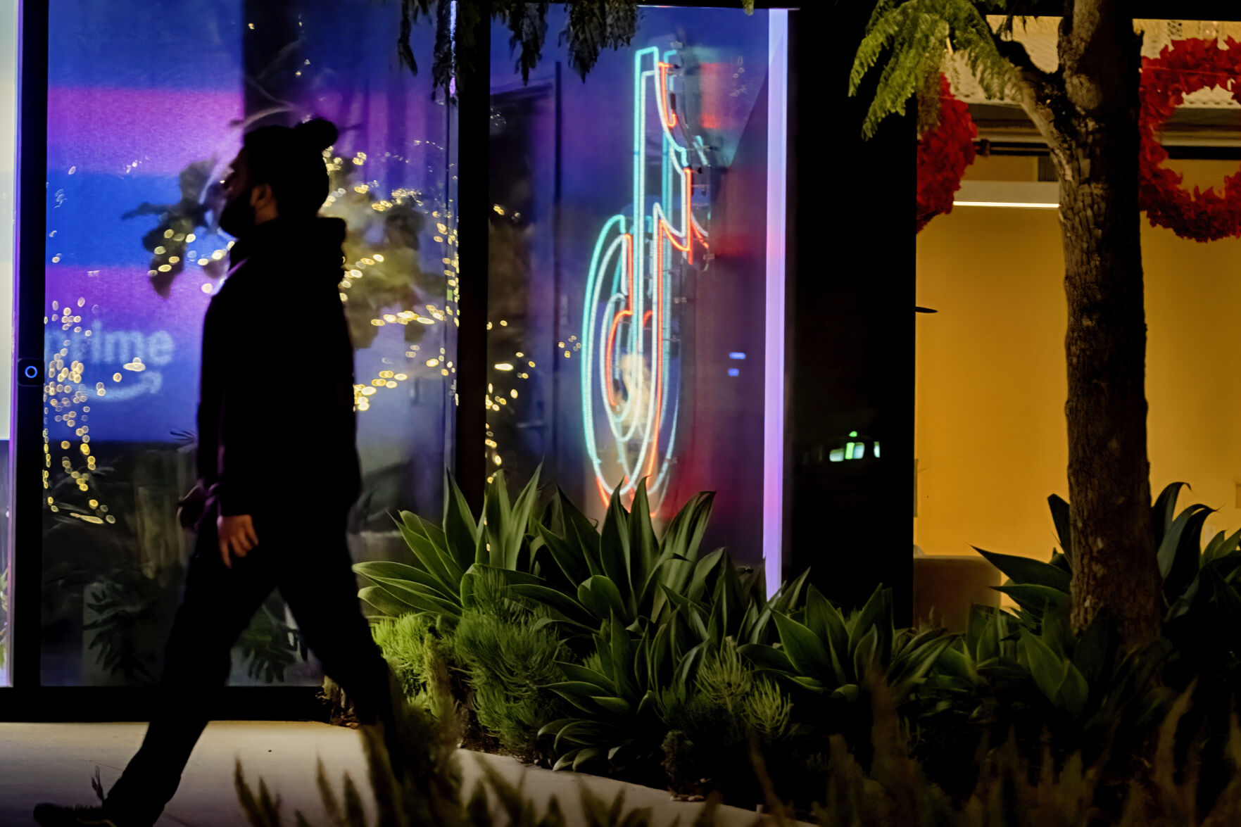 <p>A neon TikTok logo hangs in the lobby of the TikTok office building in Culver City, Calif., on Tuesday, Dec. 3, 2024. (AP Photo/Richard Vogel)</p>   PHOTO CREDIT: Richard Vogel - staff, ASSOCIATED PRESS