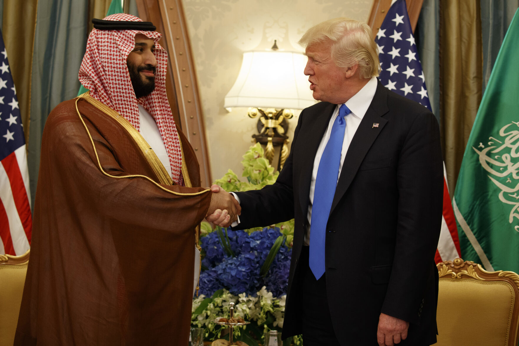 <p>FILE- President Donald Trump shakes hands with Saudi Deputy Crown Prince and Defense Minister Mohammed bin Salman during a bilateral meeting, in Riyadh, Saturday, May 20, 2017. (AP Photo/Evan Vucci, File)</p>   PHOTO CREDIT: Evan Vucci 